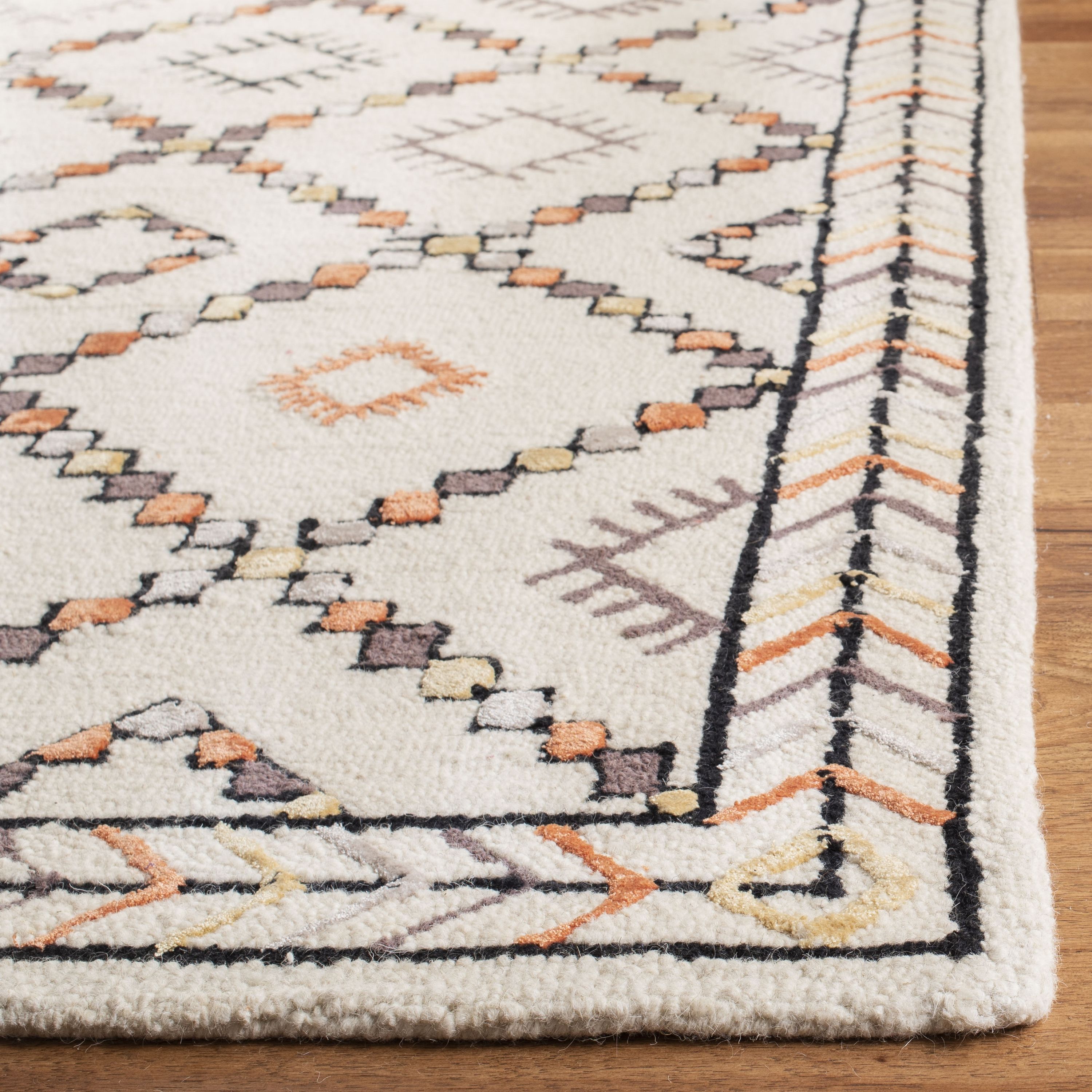 Ivory and Multi 4' x 6' Hand Tufted Wool Viscose Rug
