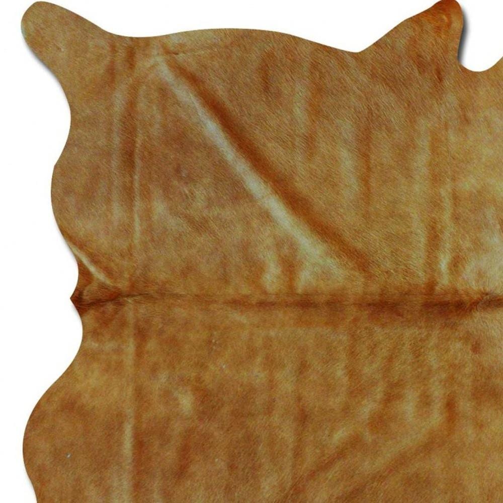 Handmade Tan Cowhide 5' x 7' Stain-Resistant Area Rug