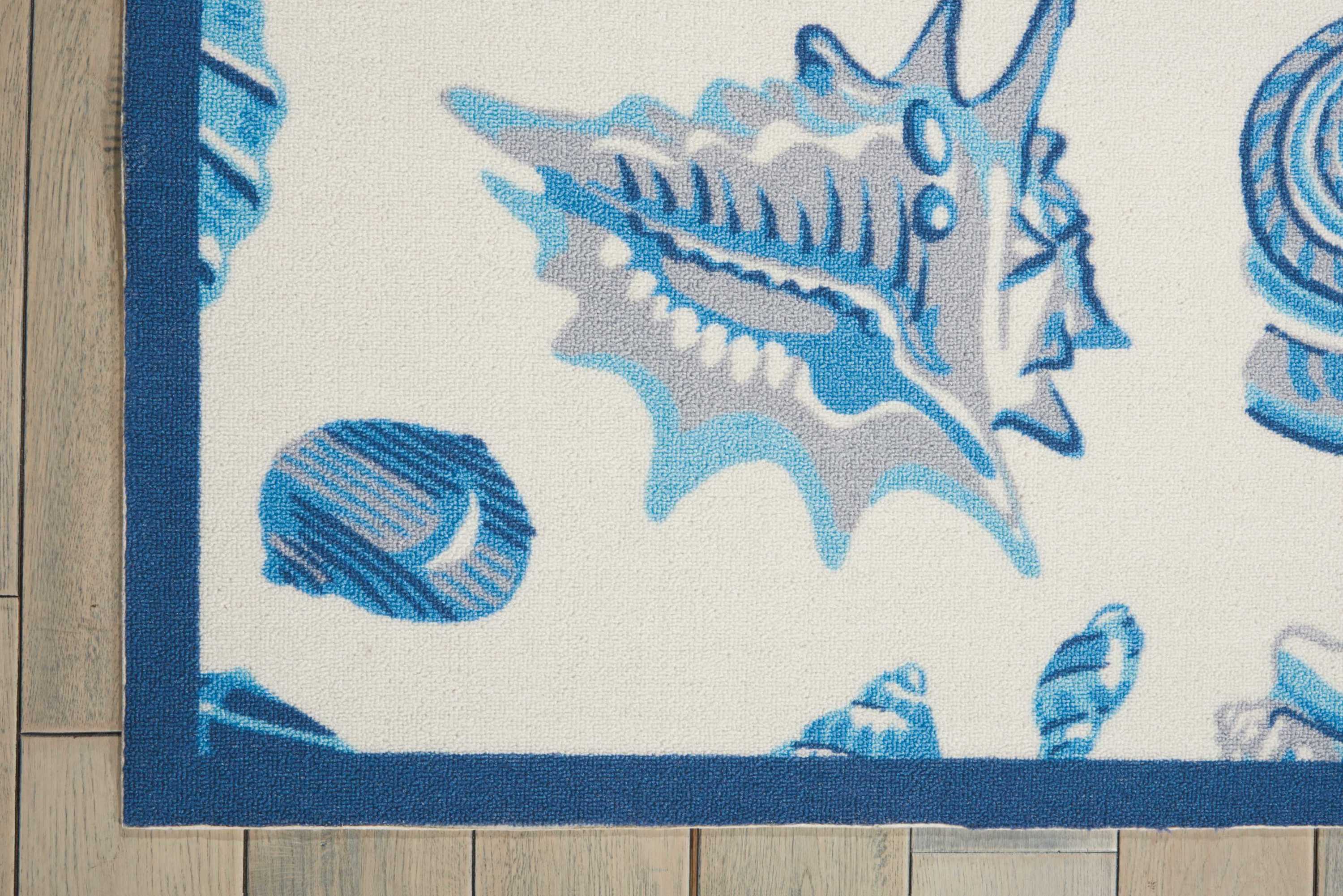 Ivory and Blue Abstract Seashell 5'3" x 7'5" Outdoor Rug