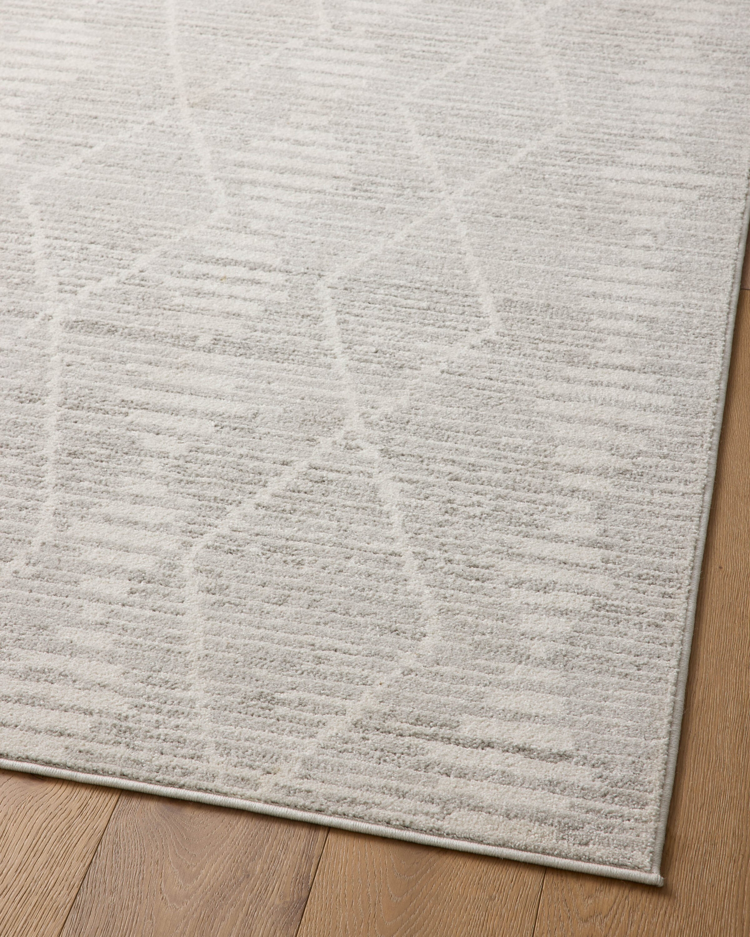 Kamala Ivory and Silver Rectangular Synthetic Area Rug 6'-7" x 9'-6"