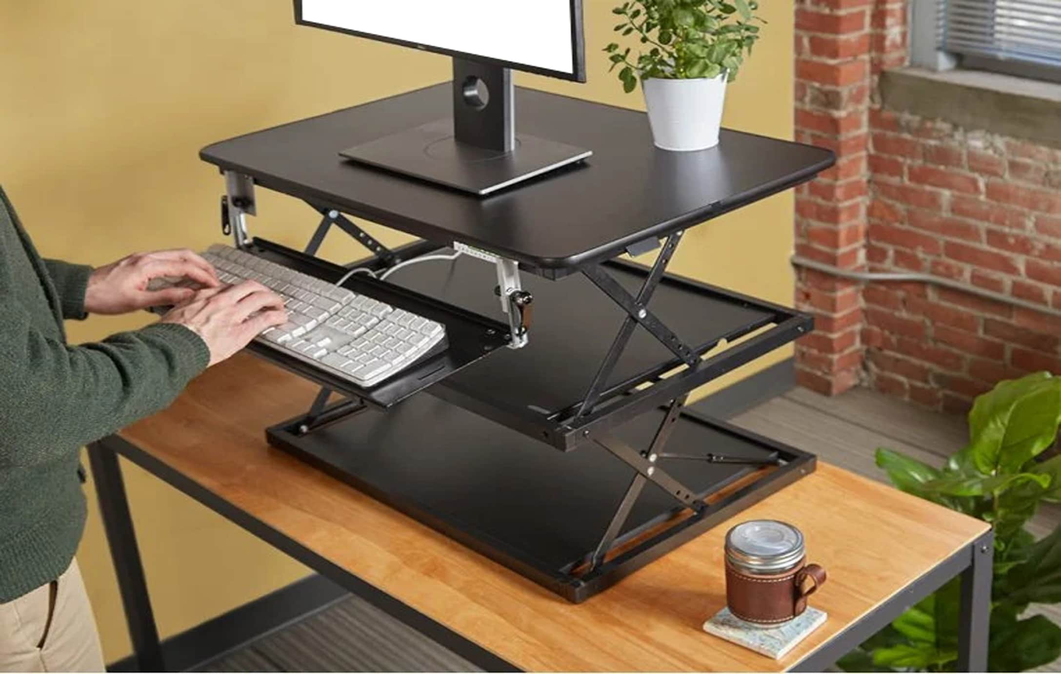 Uncaged Ergonomics Change Desk Standing Desk Riser in the Office