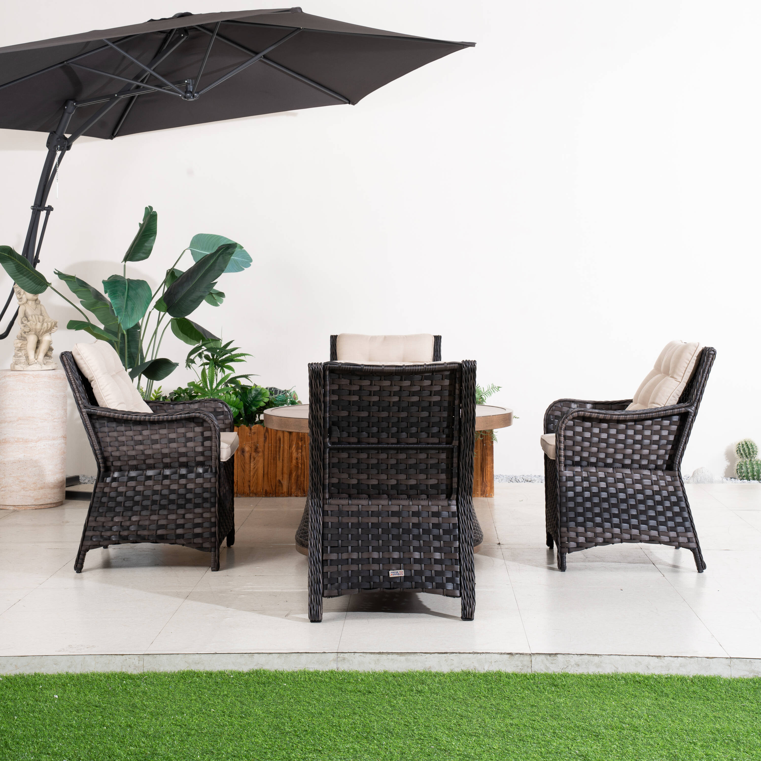 Direct Wicker 5 -Piece brown Wicker Patio Dining Set Aluminum Round Table with 4 Beige Cushions Stationary and Motion Chairs Fire Pit Included