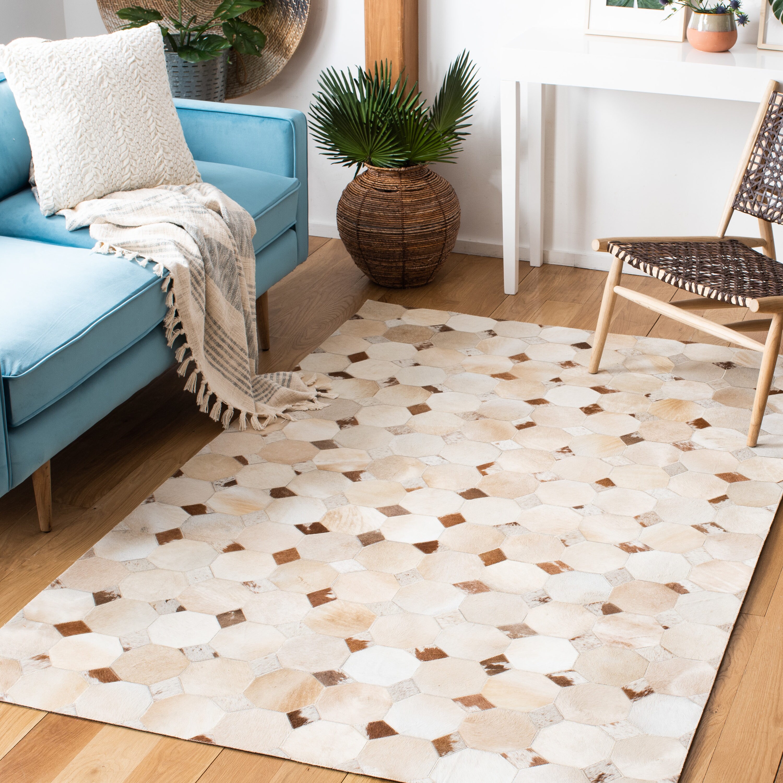 Ivory and Brown Geometric Cowhide 4' x 6' Area Rug