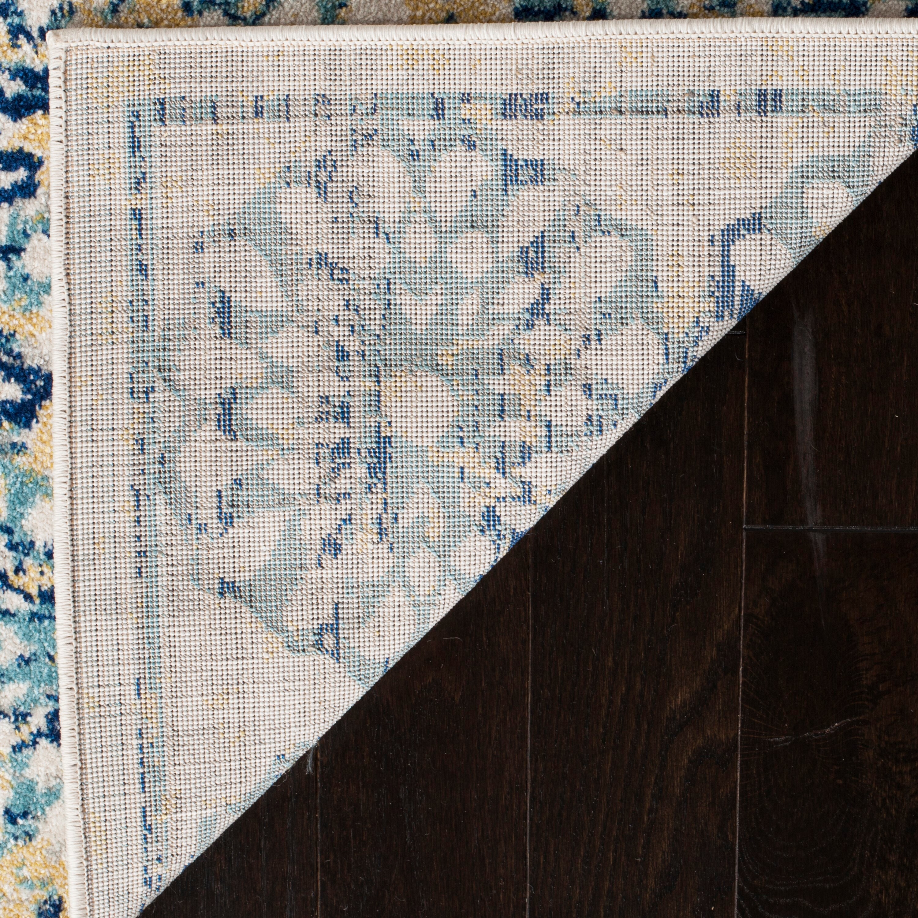 Evoke Blue and Ivory Floral Distressed 9' x 12' Area Rug
