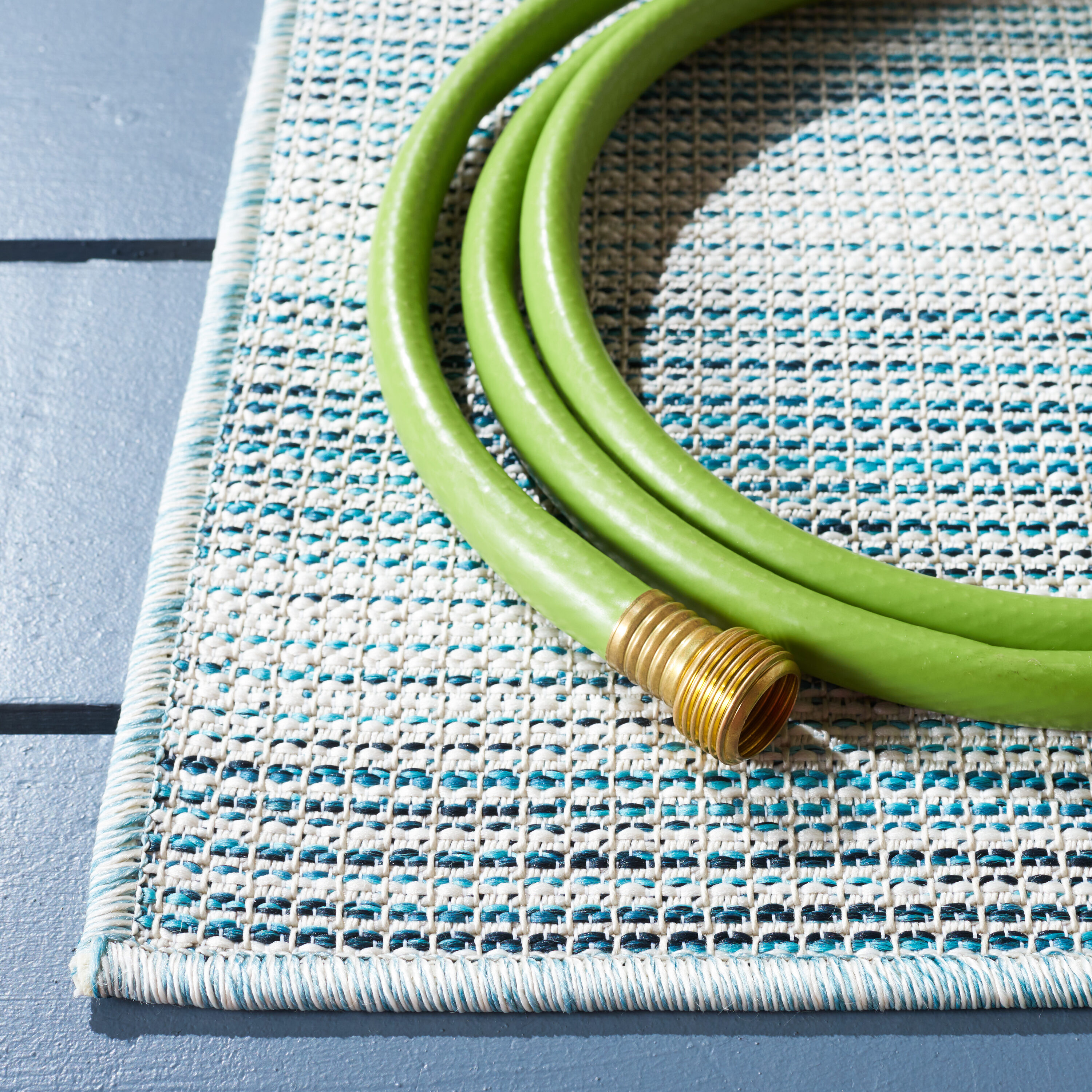 Aqua and Ivory Striped 8' x 10' Indoor/Outdoor Area Rug