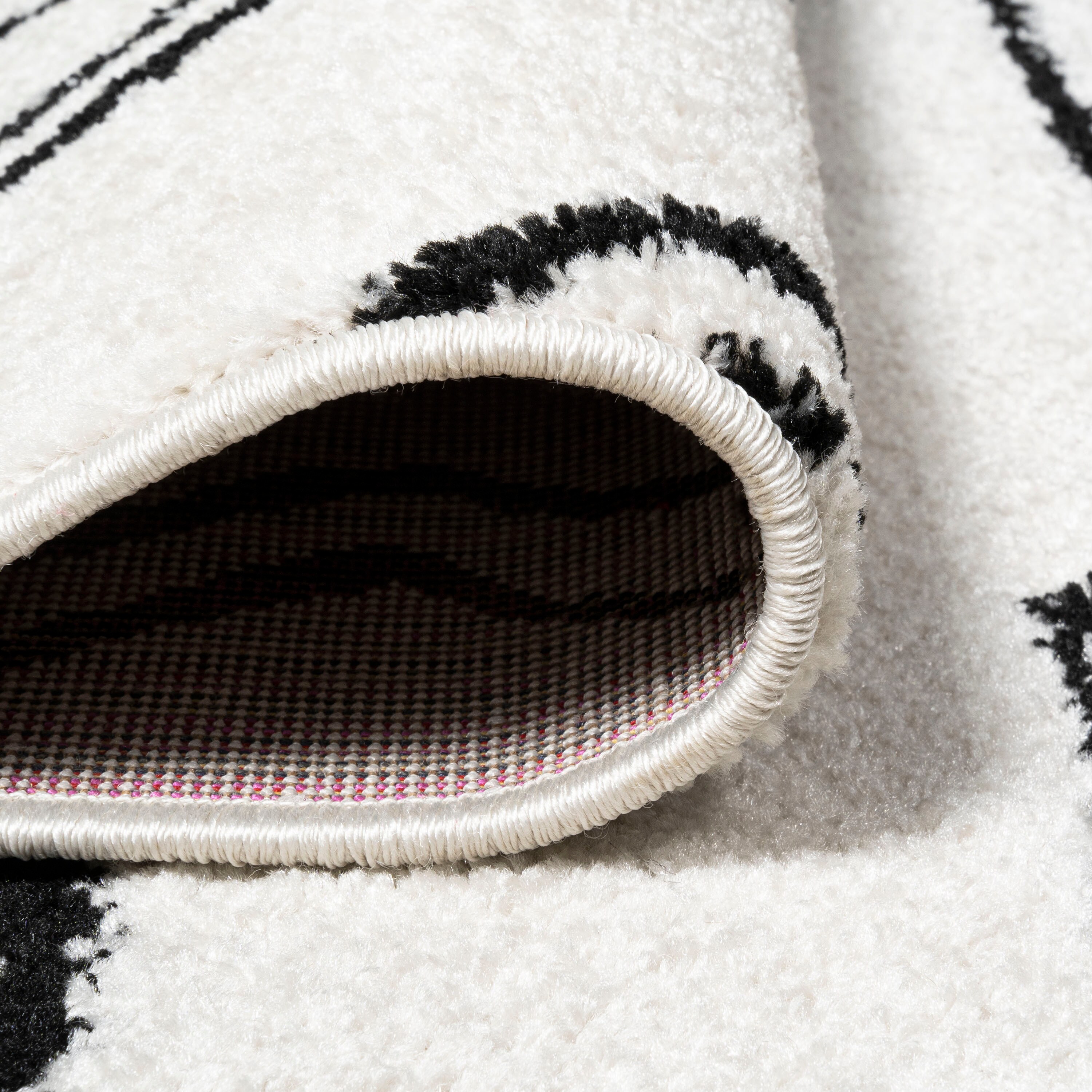 Deia Black and White Geometric Shag Area Rug