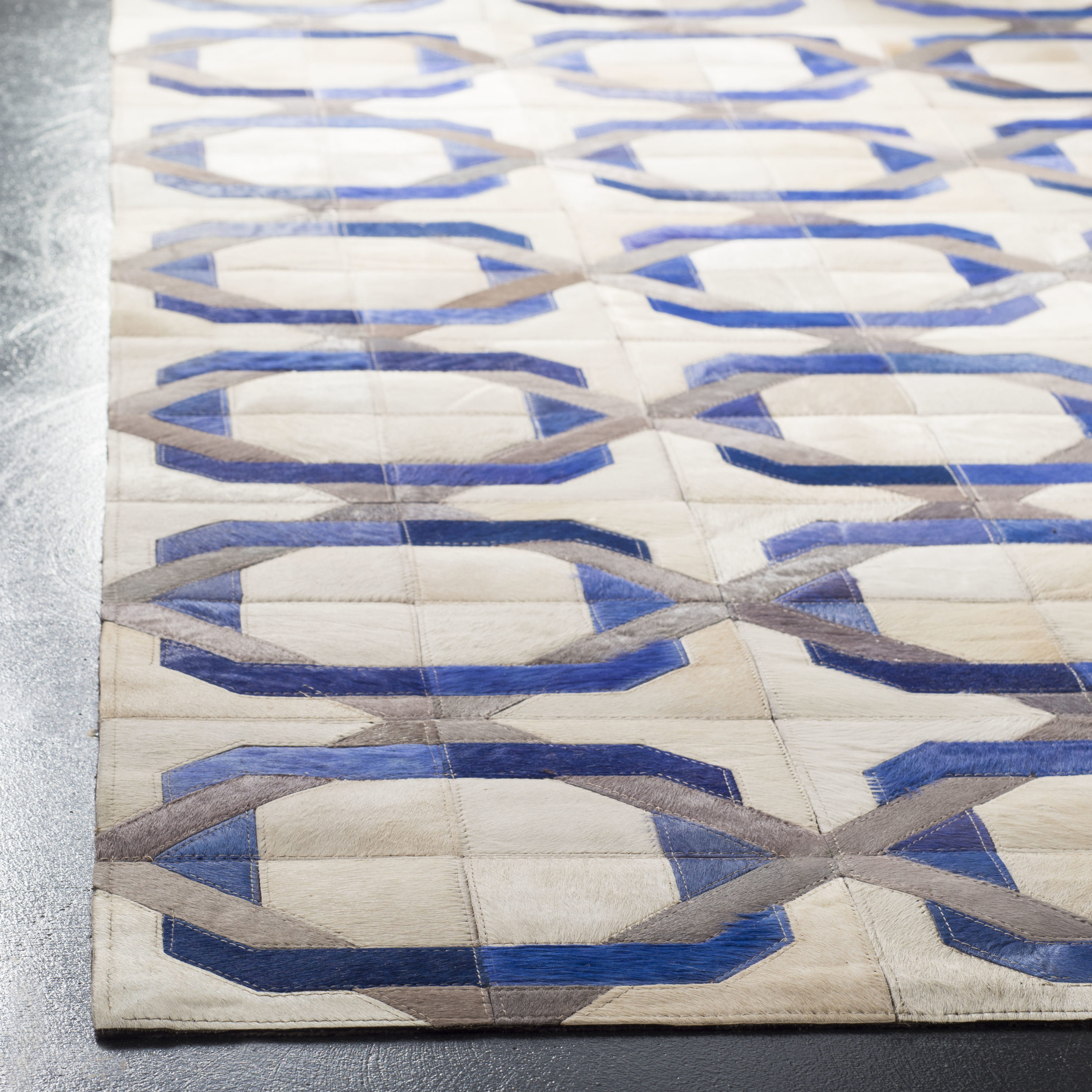 Ivory Geometric Hand-Stitched Cowhide Area Rug - Reversible & Washable