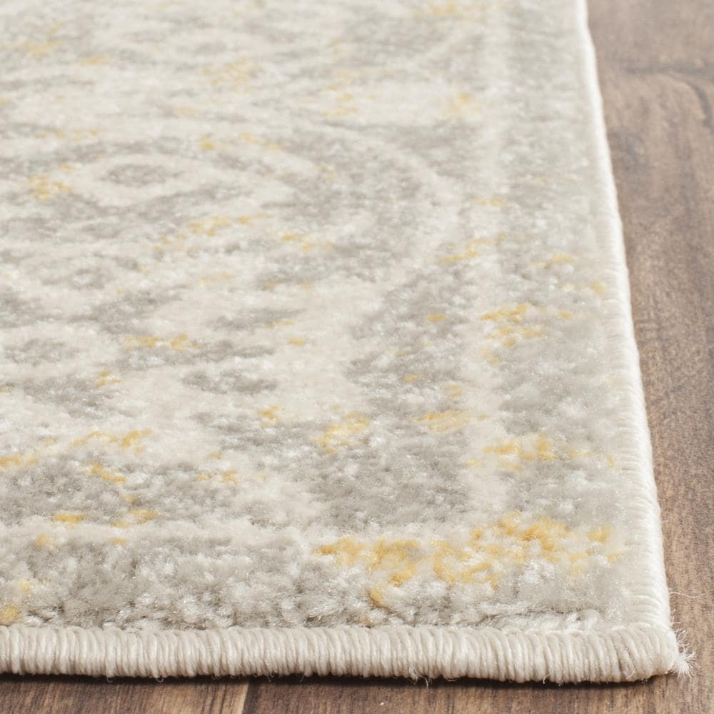 Ivory and Gray Synthetic Damask Area Rug with Border Embellishment