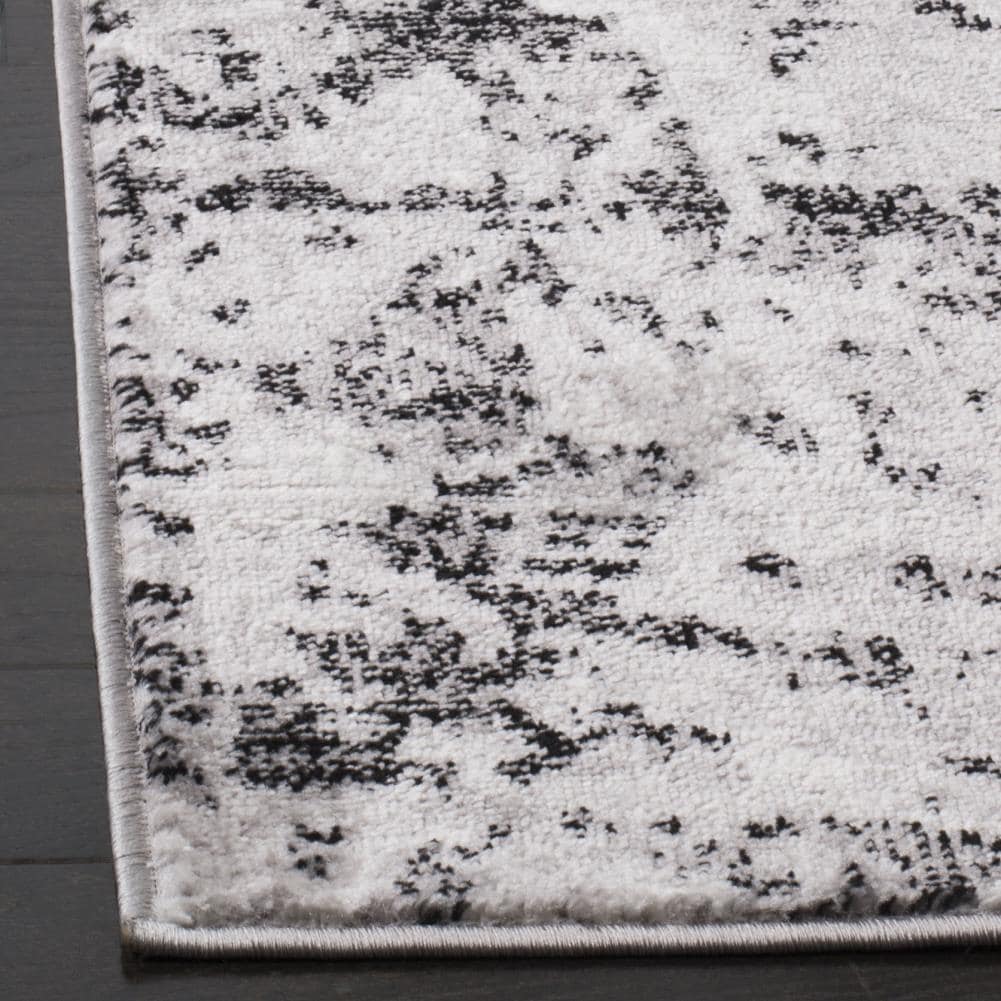Charcoal & Ivory Abstract Synthetic 8' x 10' Area Rug