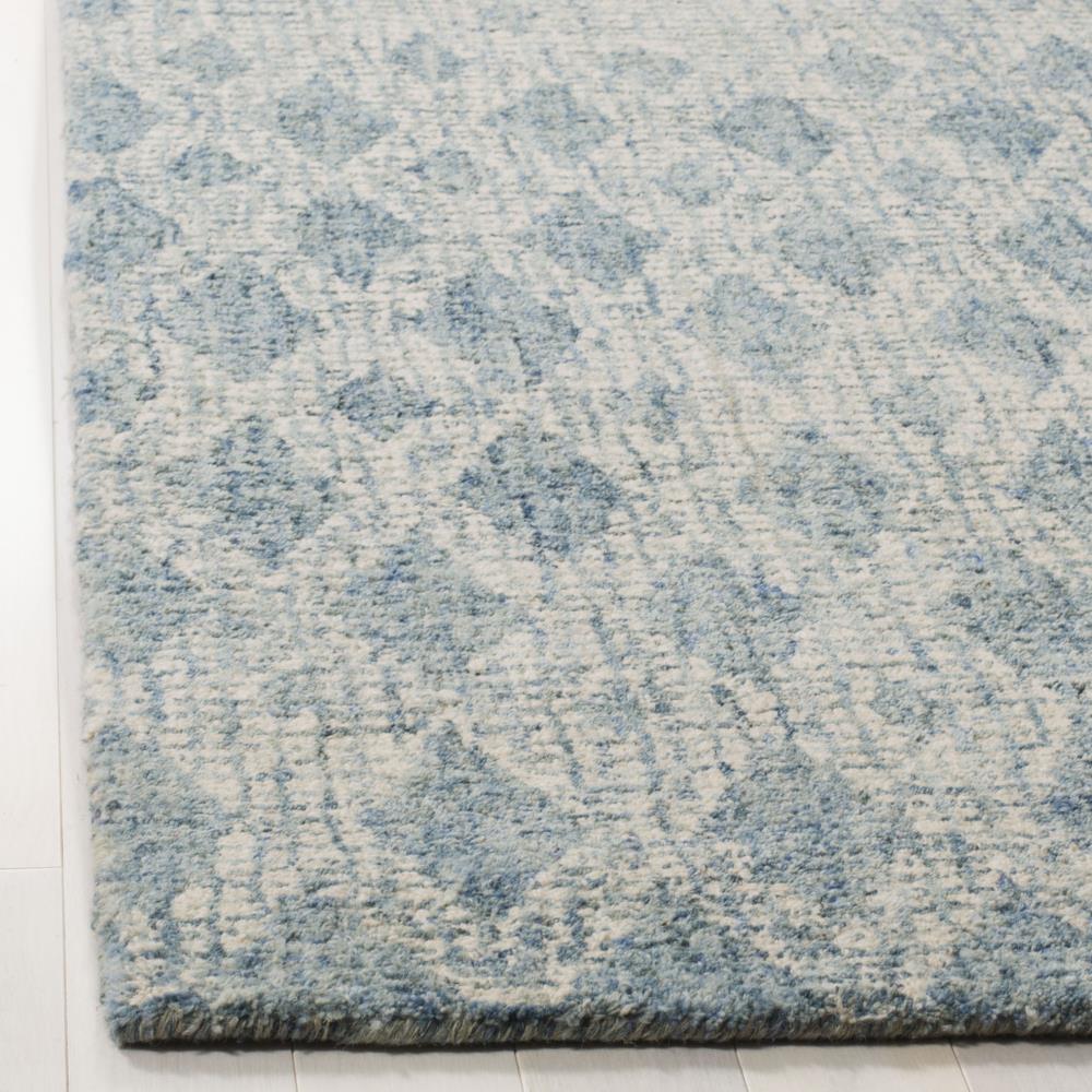 Ivory Abstract Handmade Wool 4' x 6' Reversible Rug