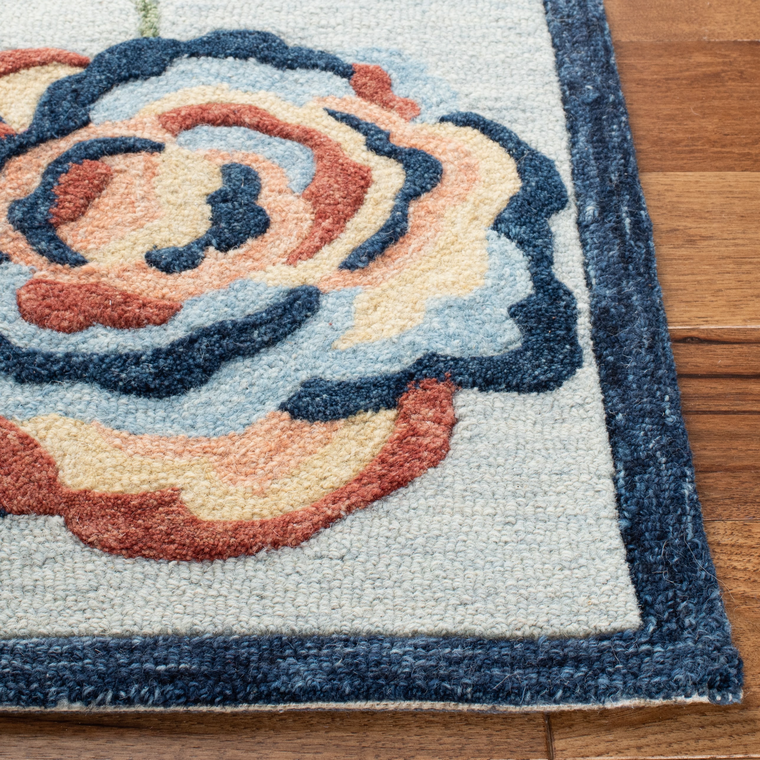 Handmade Blue Floral Wool 4' x 6' Area Rug