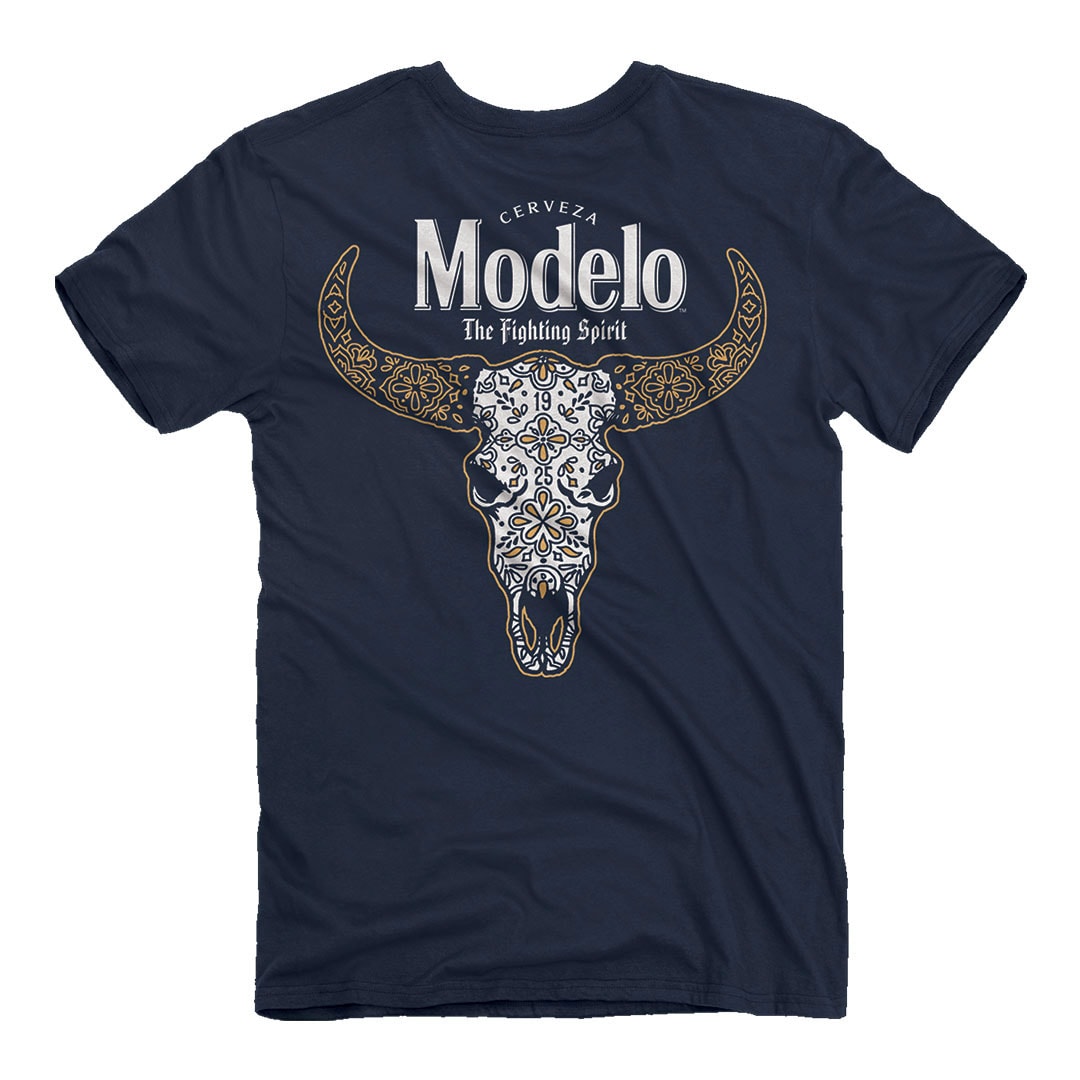 JEDCo This Modelo - Cow Skull T-Shirt is lightweight and super-soft. It features high-quality art on the back, and the iconic Modelo logo on the front left chest.