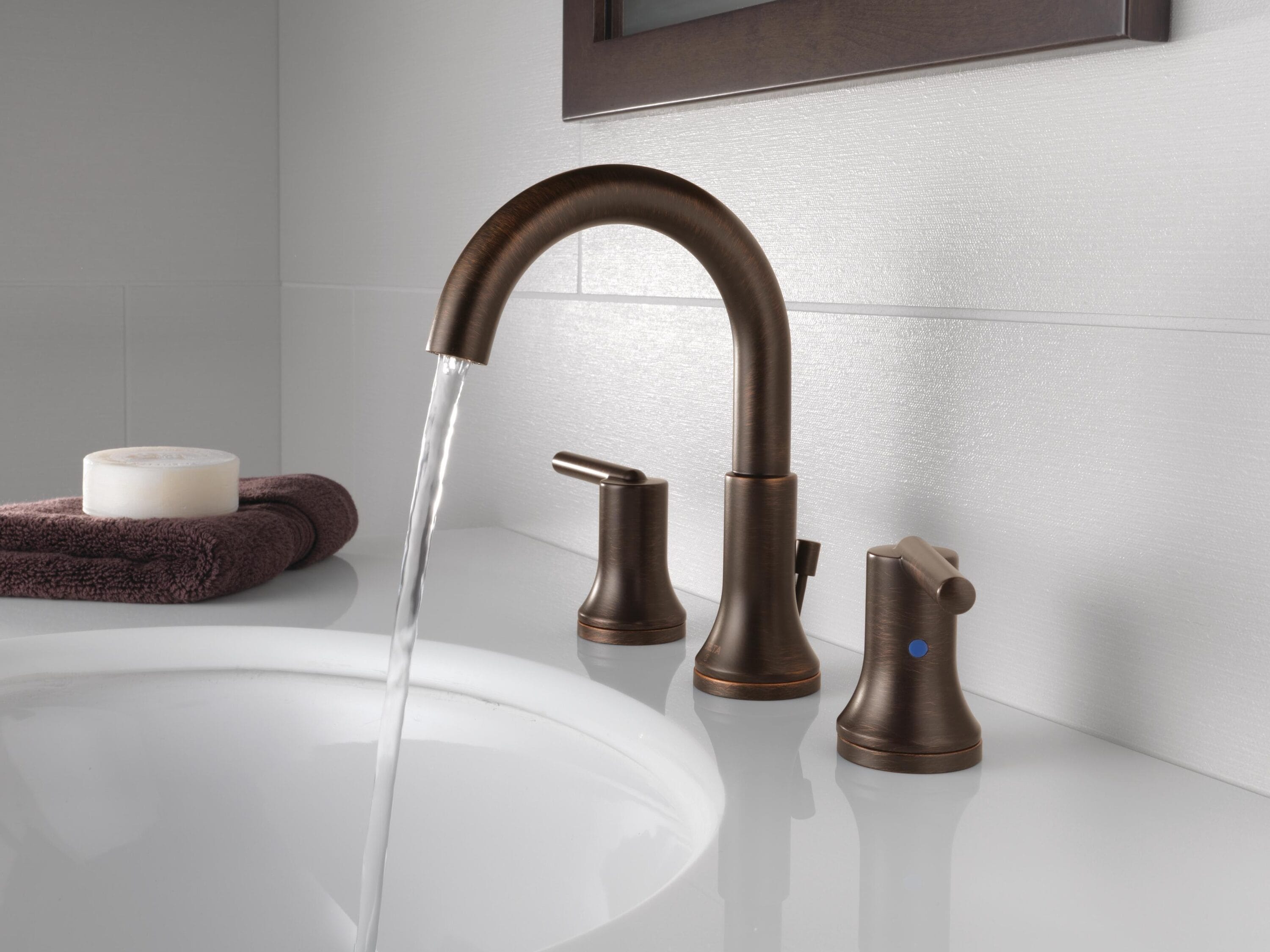 Delta Trinsic Champagne Bronze 4-in centerset 2-handle WaterSense Bathroom  Sink Faucet with Drain and Deck Plate (5.875-in) in the Bathroom Sink  Faucets department at