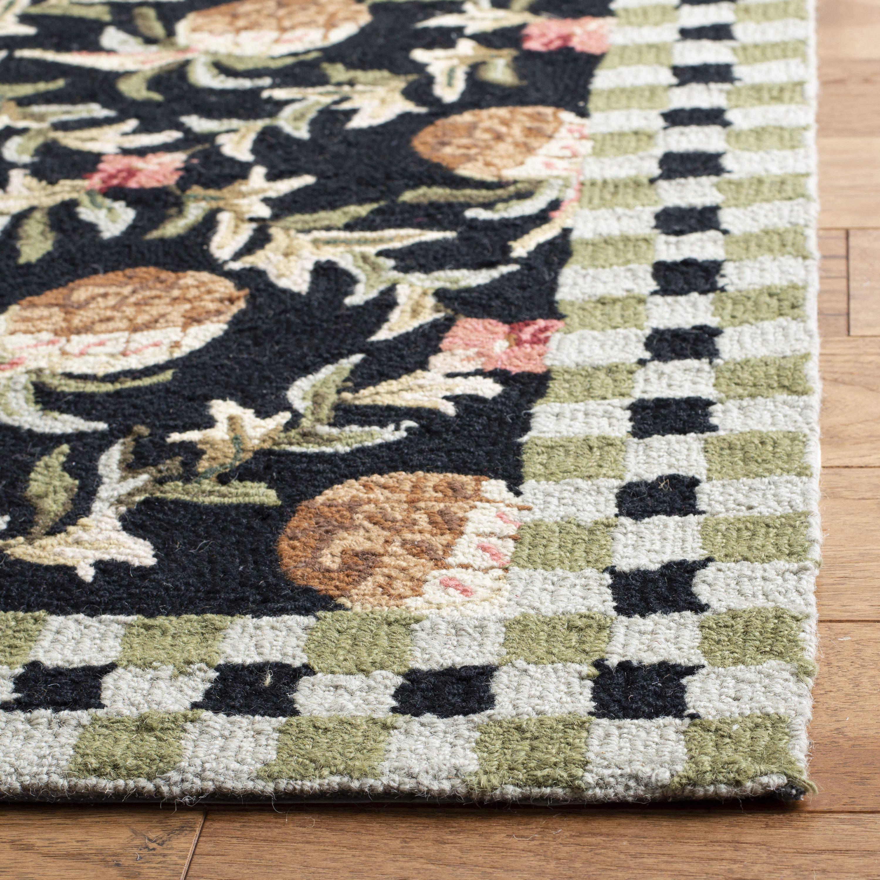 Handmade Ivory and Black Floral Wool Round Area Rug