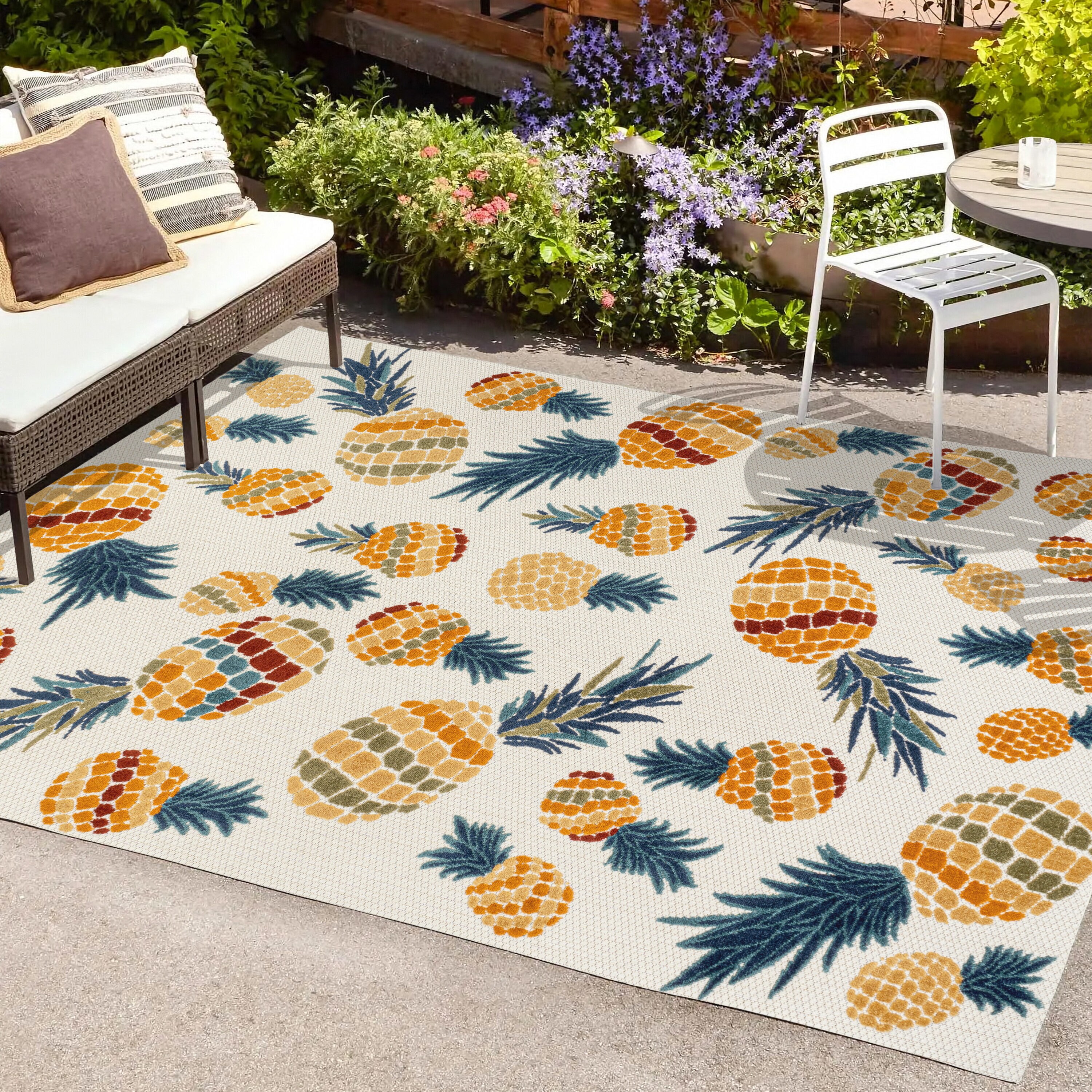 4' x 6' Ivory and Orange Floral Synthetic Area Rug