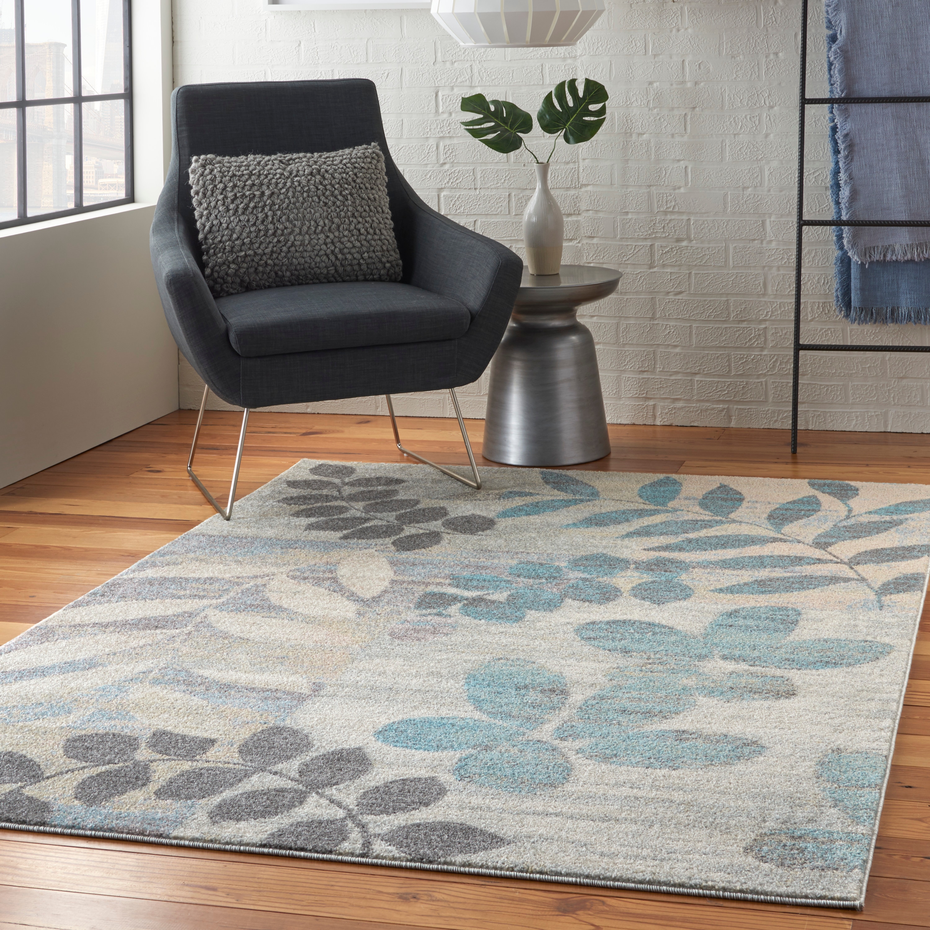 Ivory and Light Blue Floral Synthetic 4' x 6' Rug
