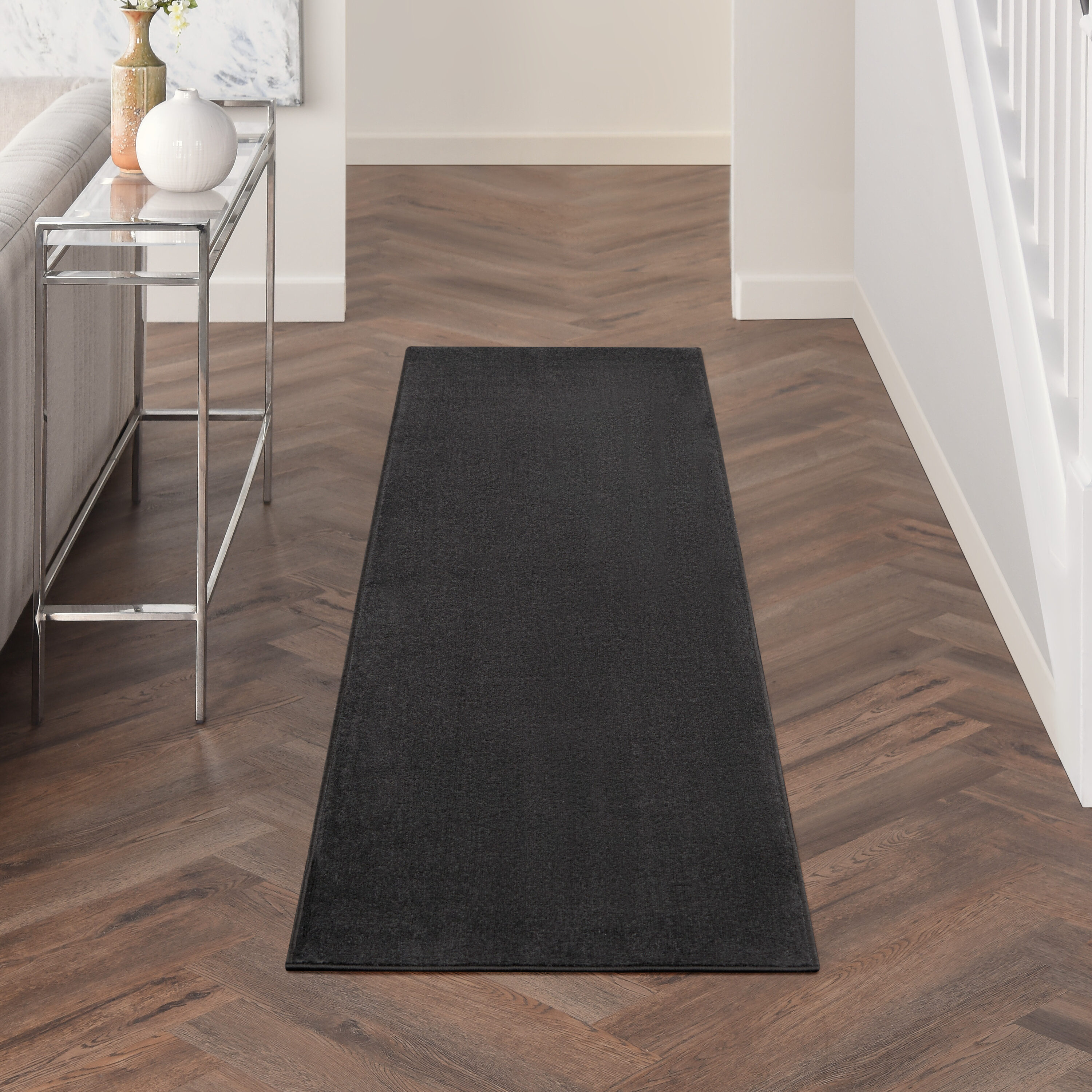 Nourison 099446821621 Essentials 2 x 6 (ft) Loomed Polypropylene Black Rectangular Indoor/Outdoor Solid Runner rug