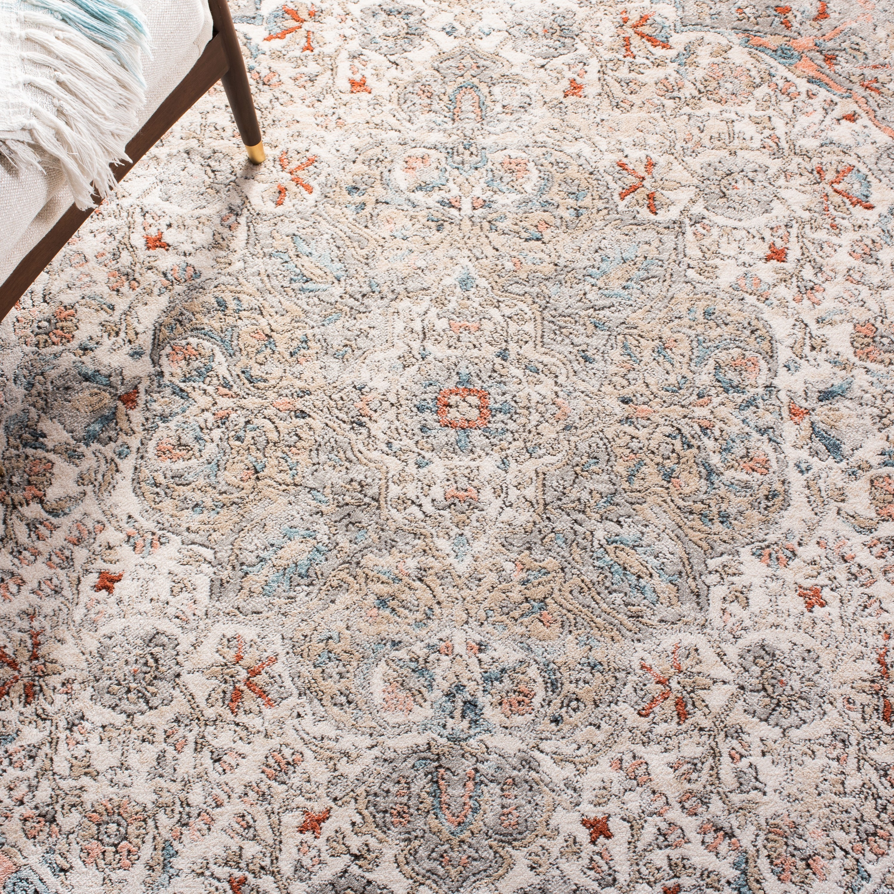 Ivory and Grey Medallion Synthetic 4' x 6' Area Rug