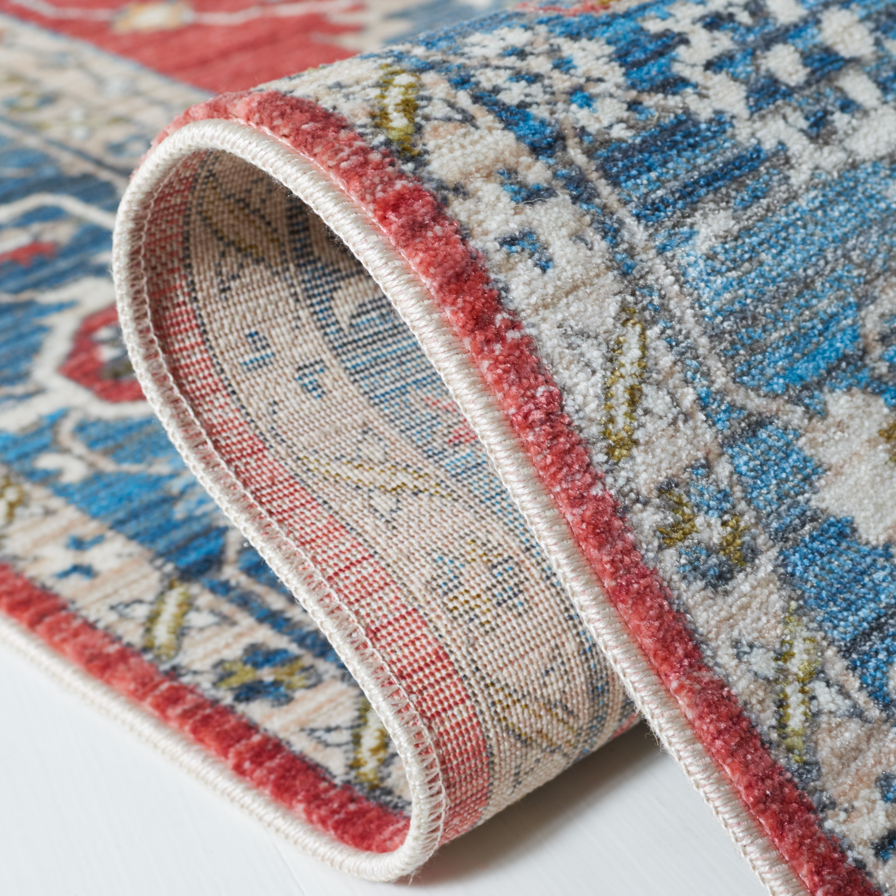 Red and Blue Floral Motif Low Pile Runner Rug