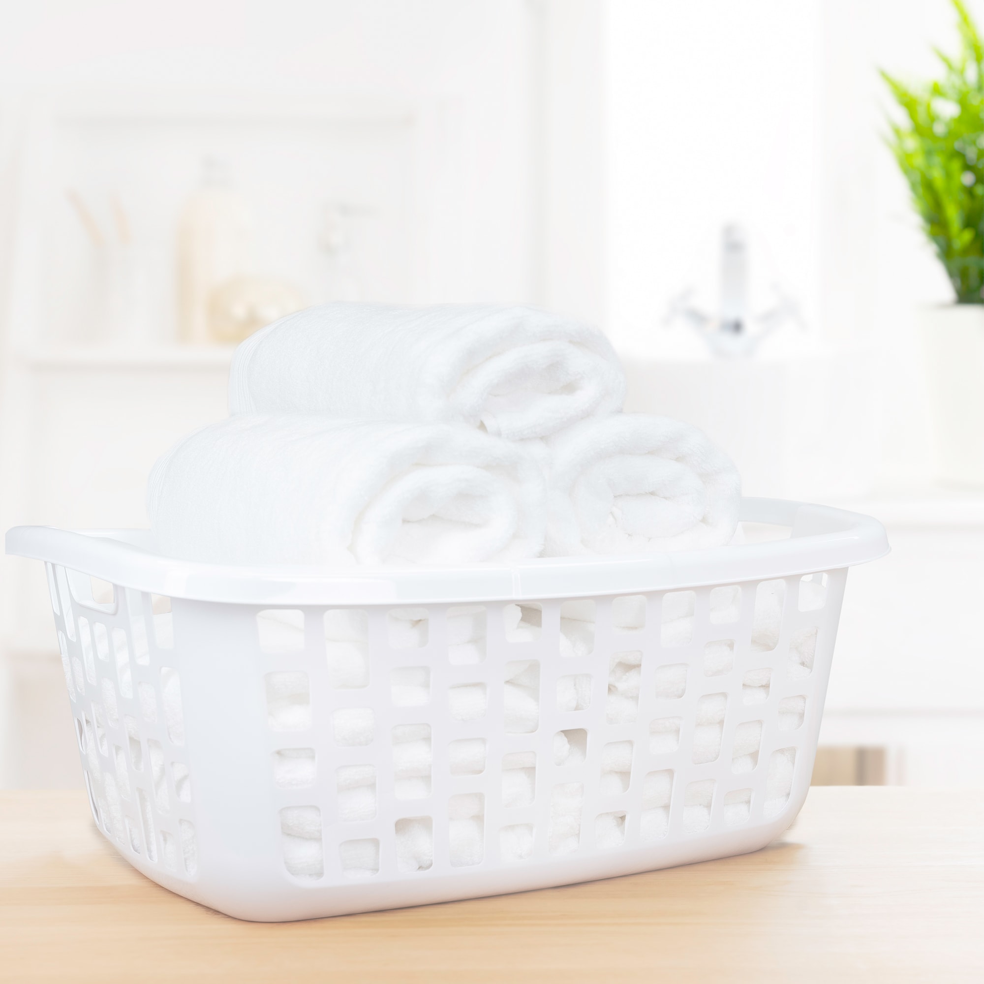 Style Selections 1.25-Bushel Plastic Laundry Basket in the Laundry Hampers  & Baskets department at