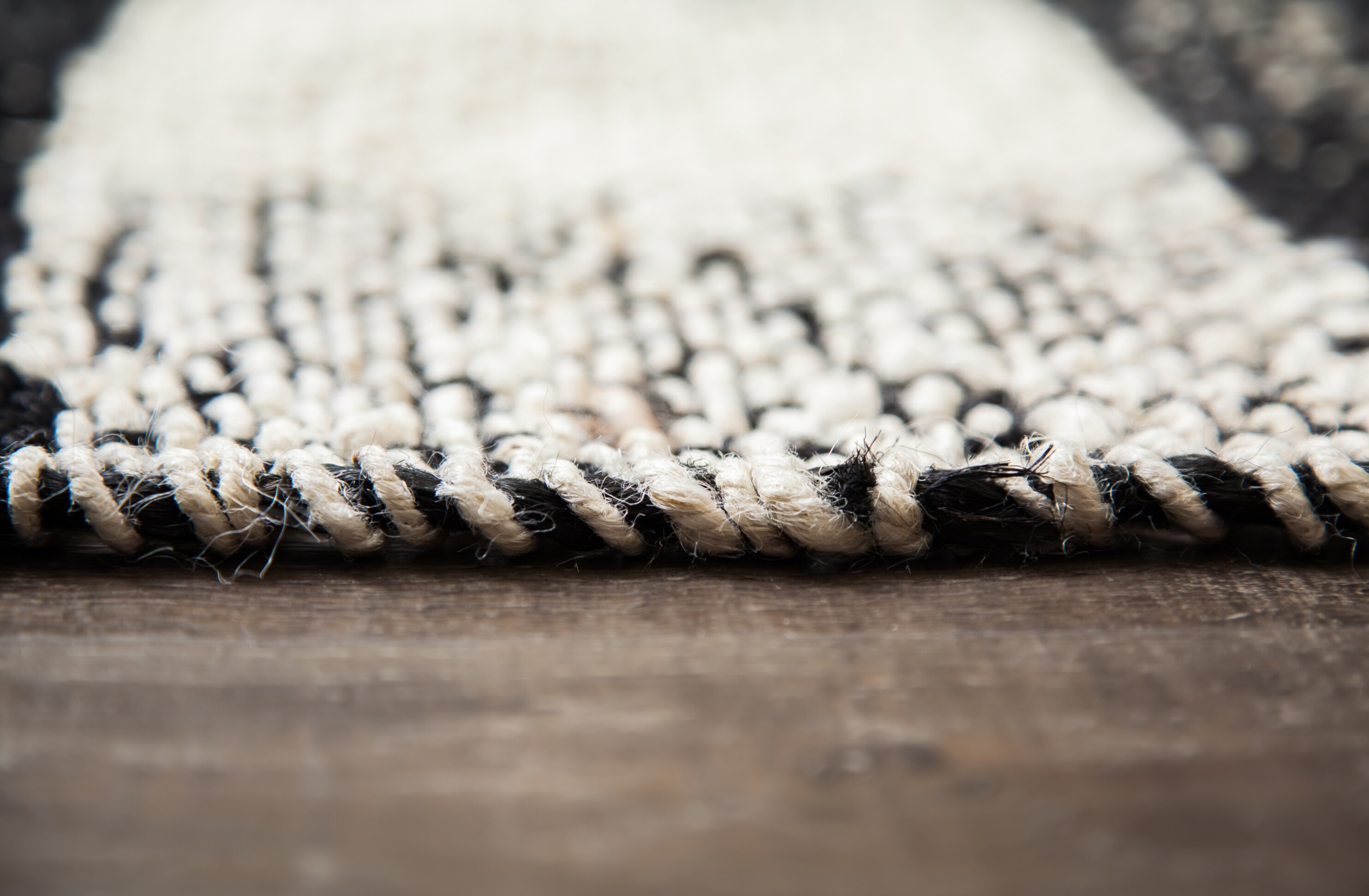 Handmade Black and Ivory Wool 8' x 10' Plaid Rug