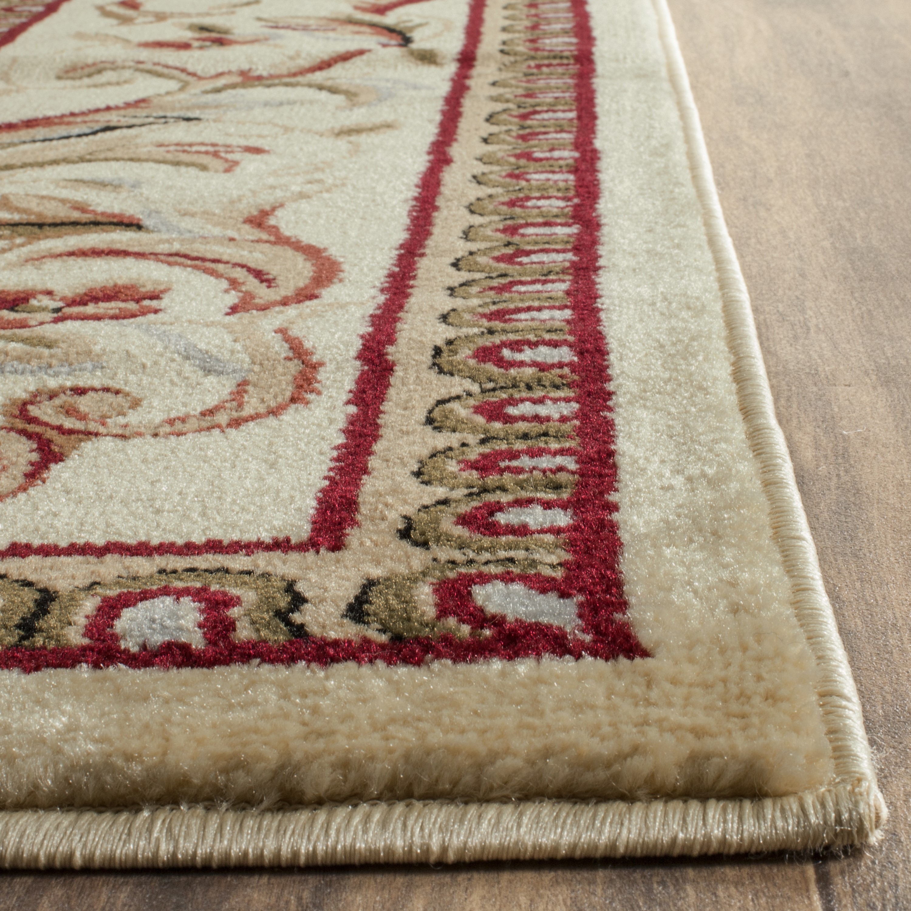 Ivory Floral Tufted Reversible Synthetic 9' x 12' Area Rug
