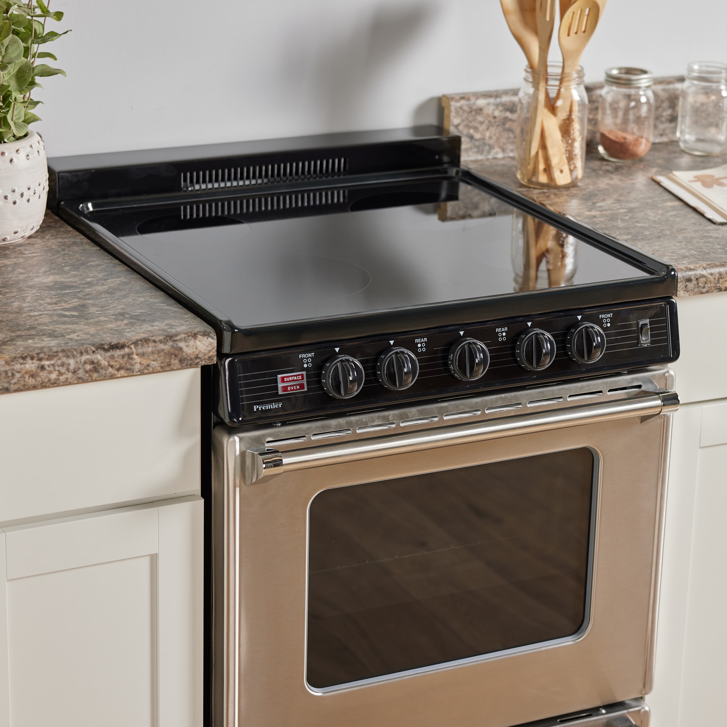 GE 24-in Glass Top 4 Burners 2.9-cu ft Steam Cleaning Freestanding