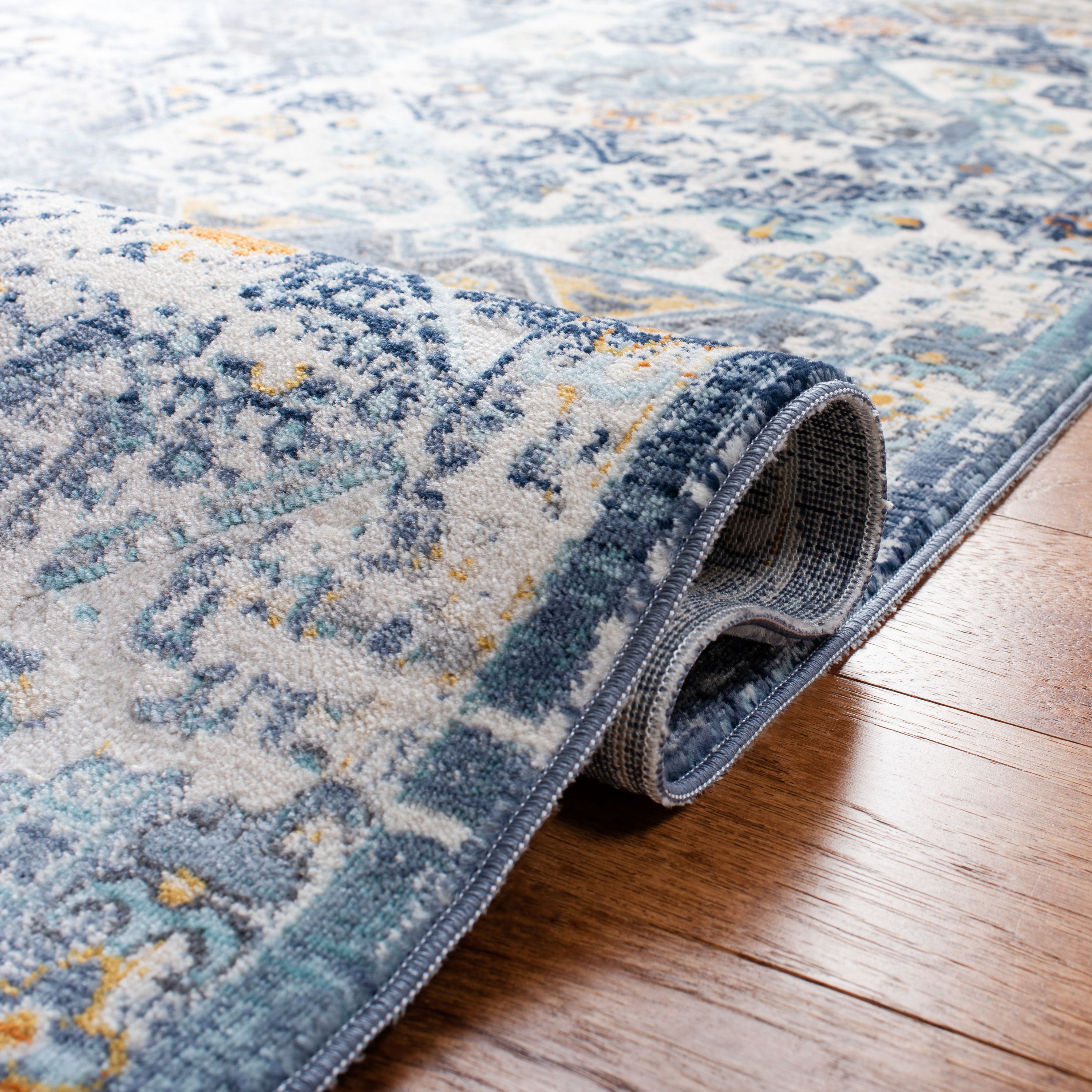 Ivory and Navy Floral Geometric Wool Area Rug