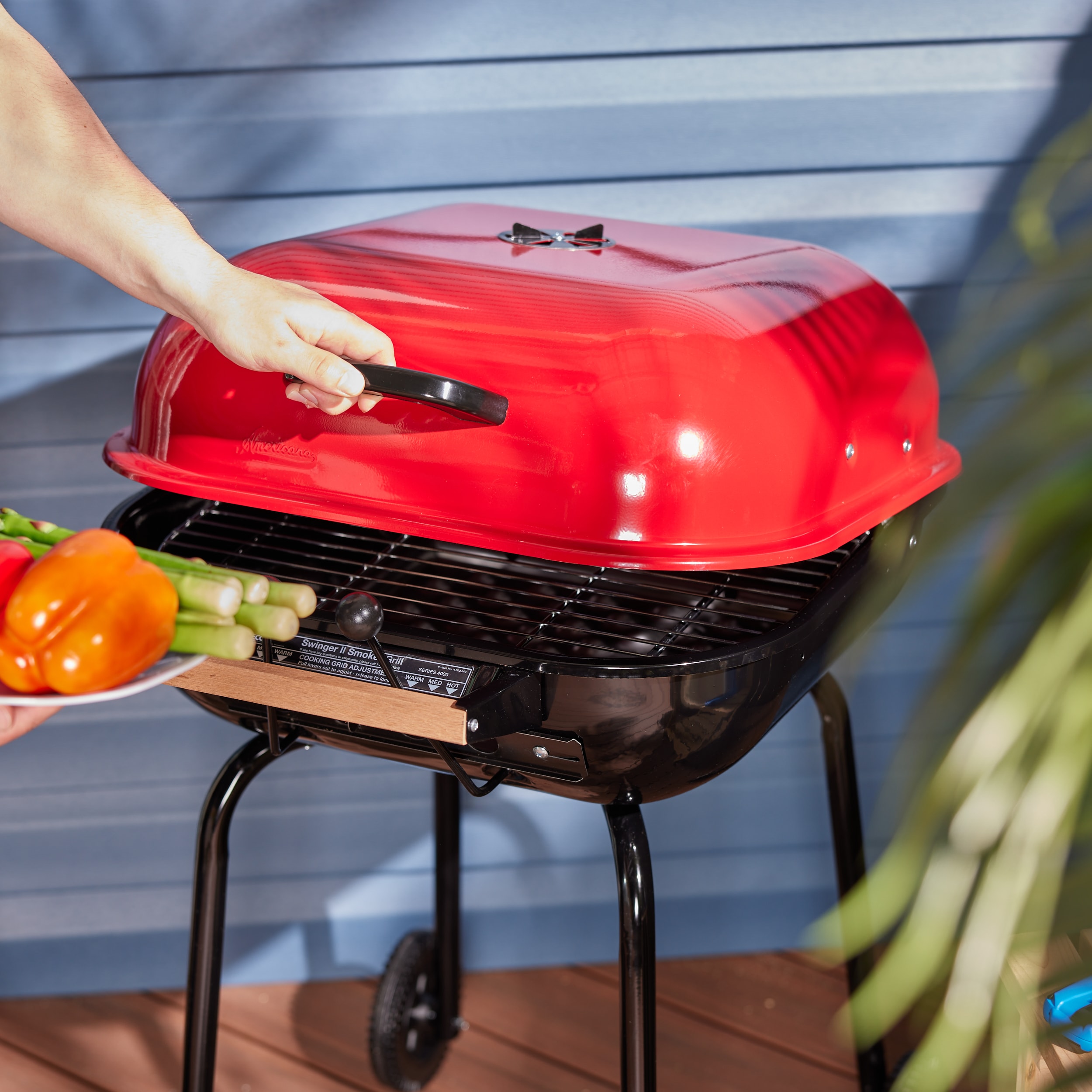 Americana The Swinger 21.25-in W Red Charcoal Grill in the 
