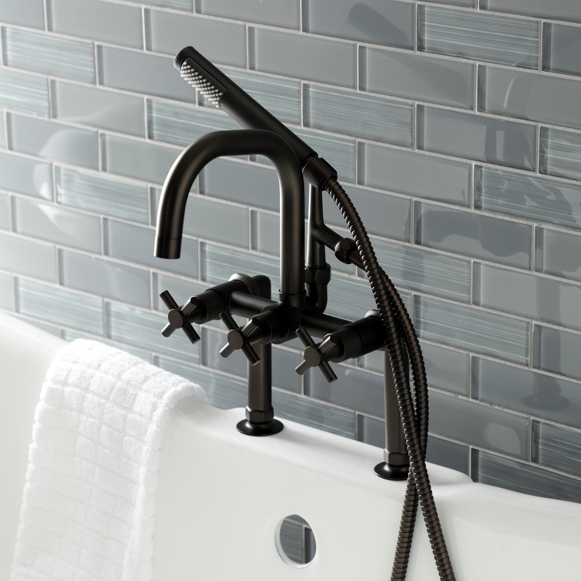 Kingston Brass WLAE8405DX Concord Oil-rubbed bronze 3-handle Deck-mount Roman High-arc Bathtub Faucet with Hand Shower ( Valve Included )