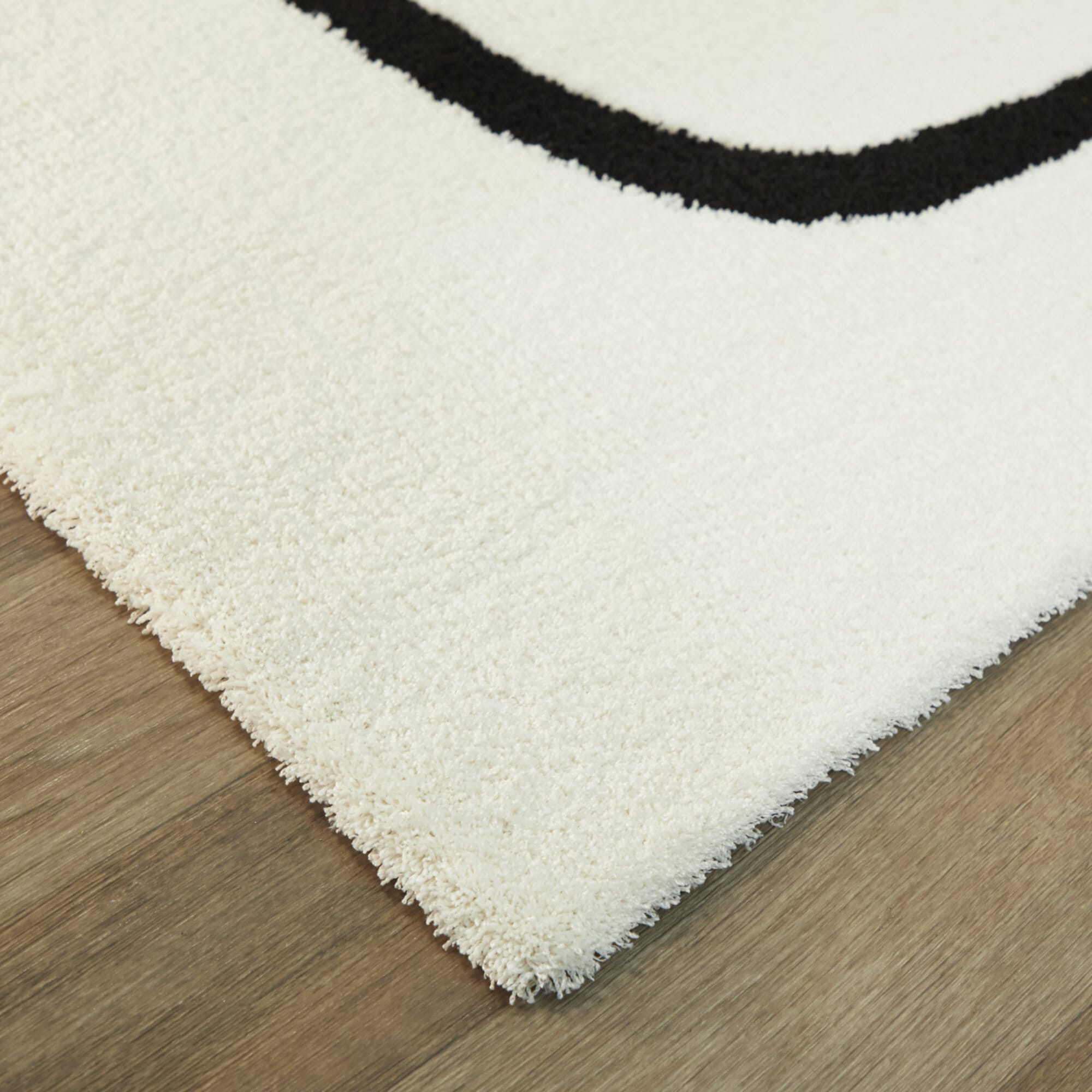 White and Black Abstract Polyester Rectangular Rug 5' x 7'