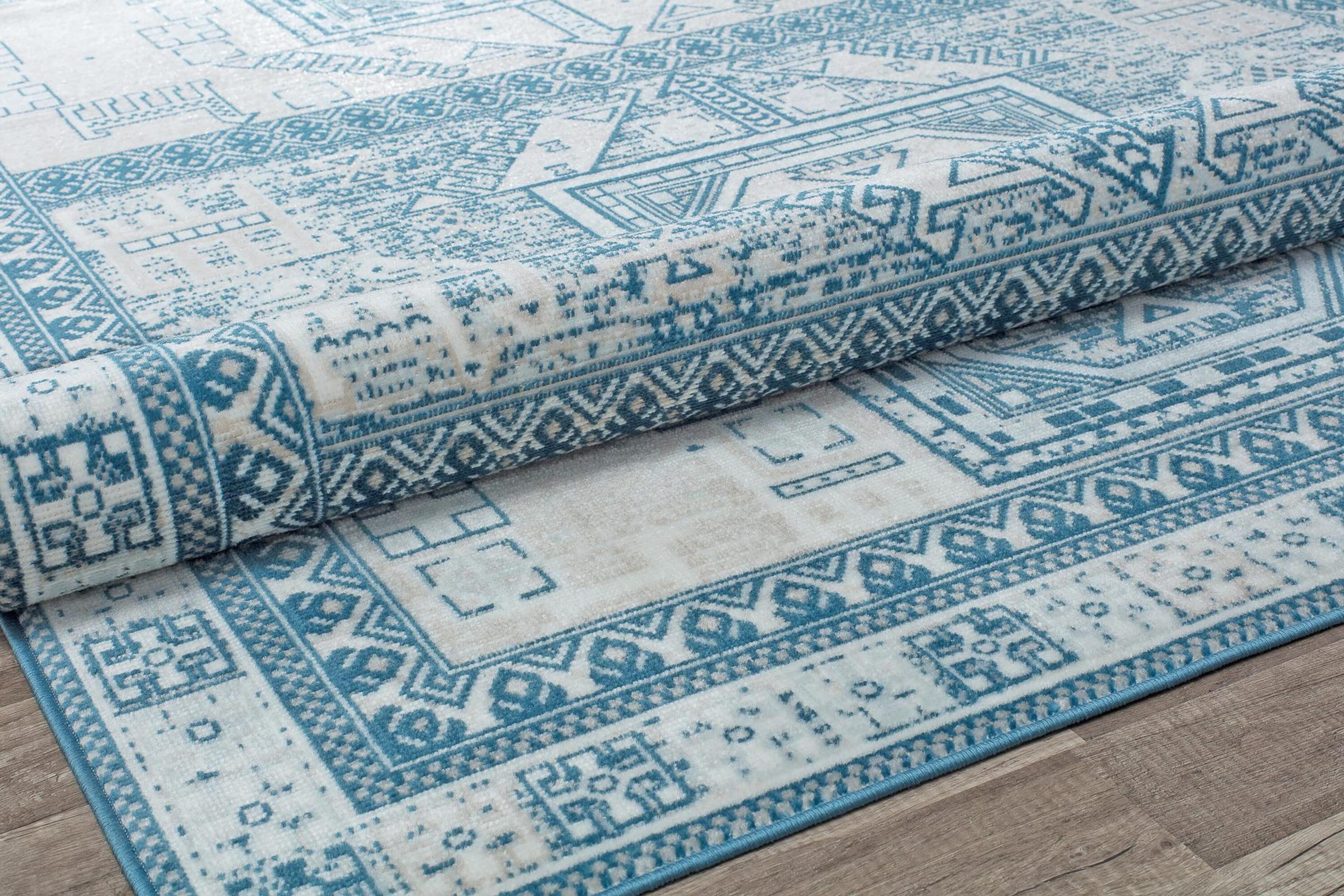Azure Elegance 5' x 7' Reversible Blue Synthetic Area Rug