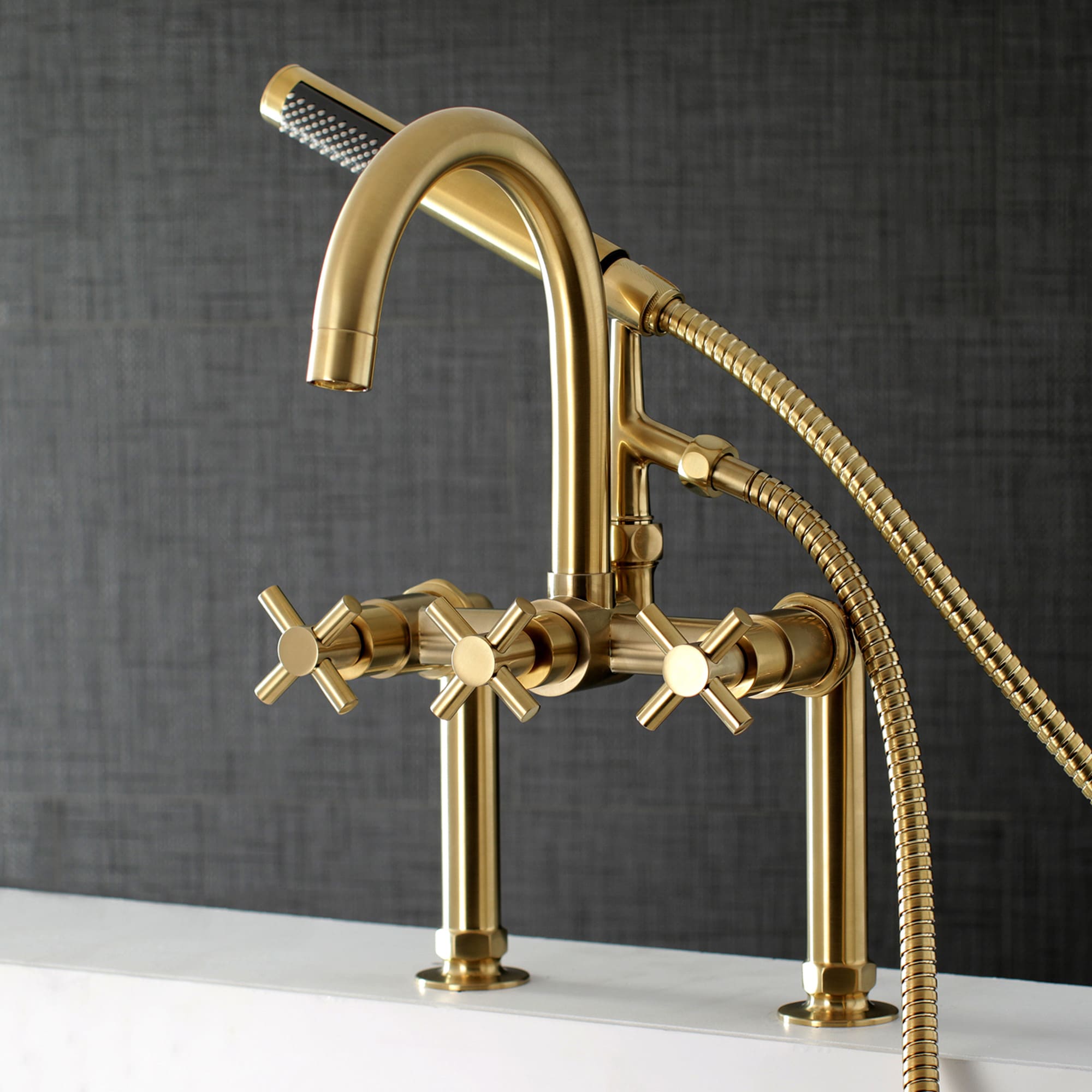 Kingston Brass WLAE8107DX Concord Brushed brass 3-handle Deck-mount Roman High-arc Bathtub Faucet with Hand Shower ( Valve Included )