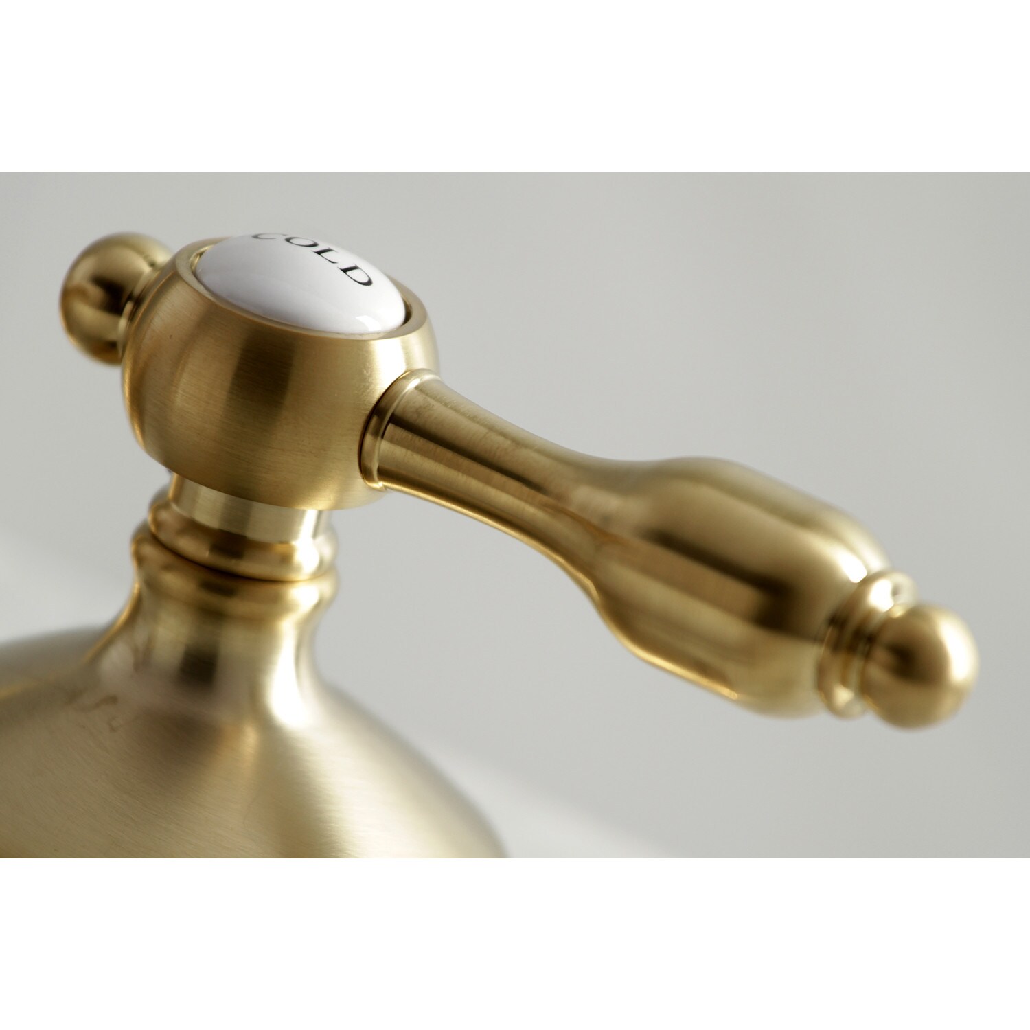 Kingston Brass Tudor Brushed Brass Widespread 2 Handle Bathroom Sink Faucet With Drain In The 6779