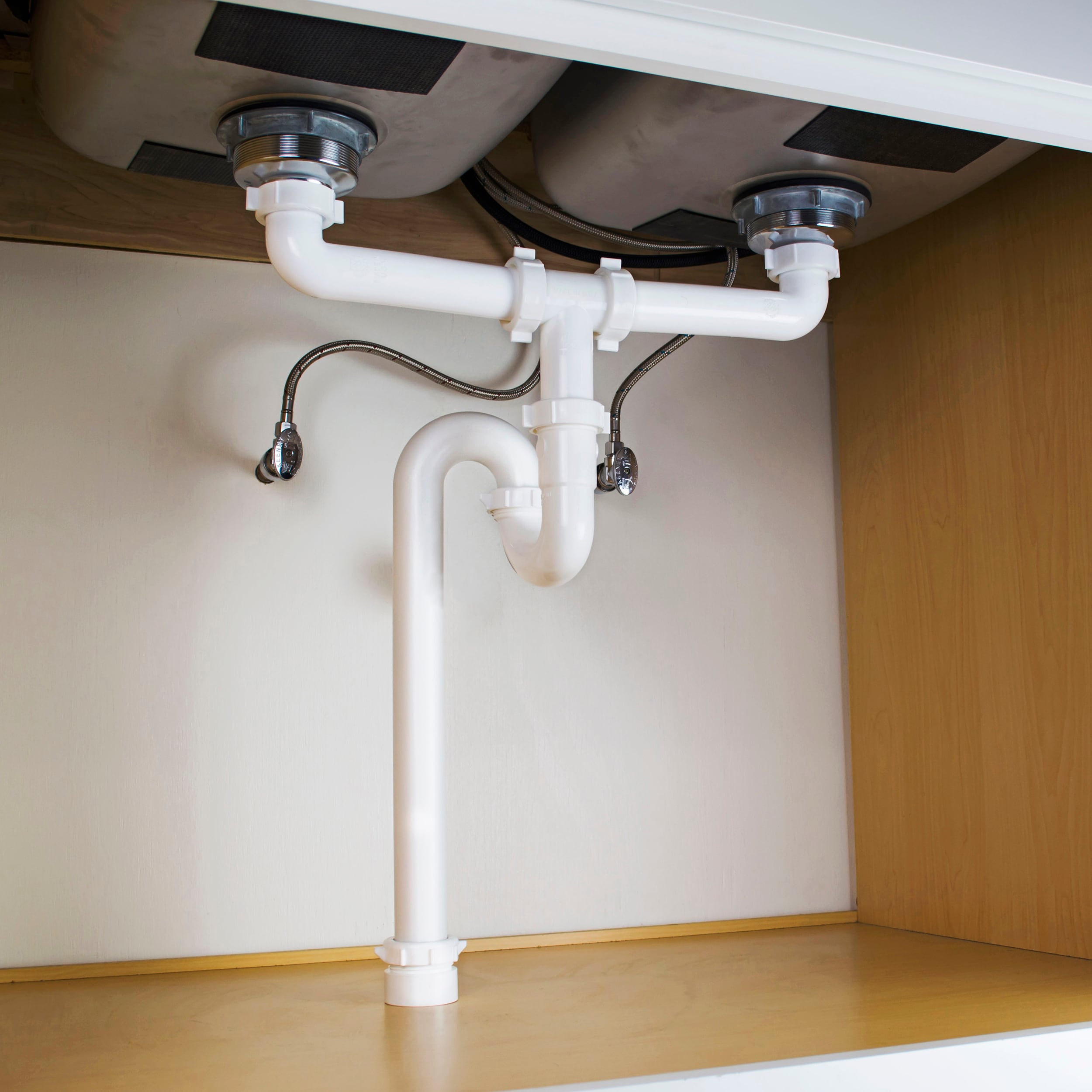 How to Plumb a Sink Drain Through the Floor 