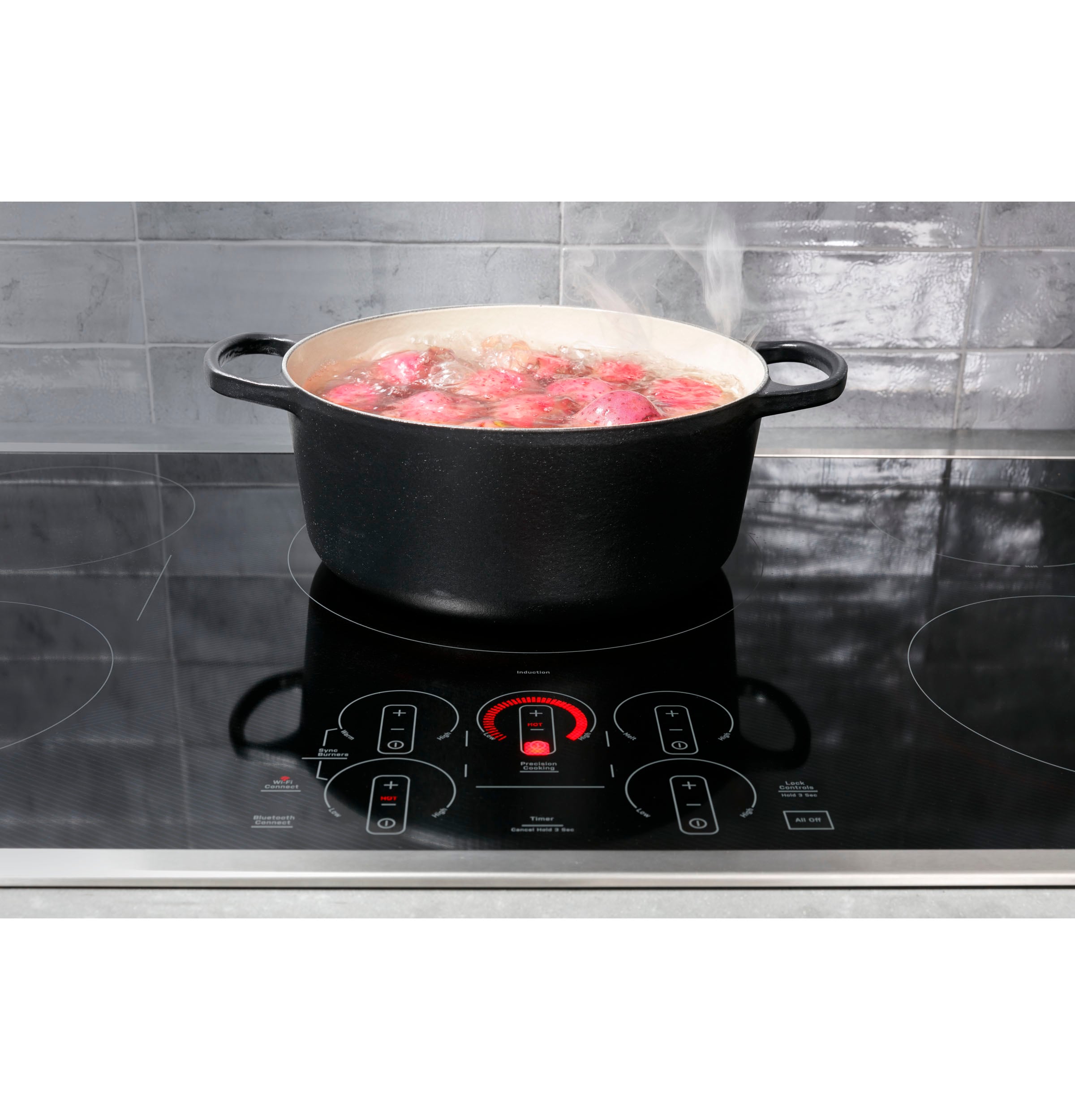 GE Profile 36-in 5 Burners Black Smart Induction Cooktop in the