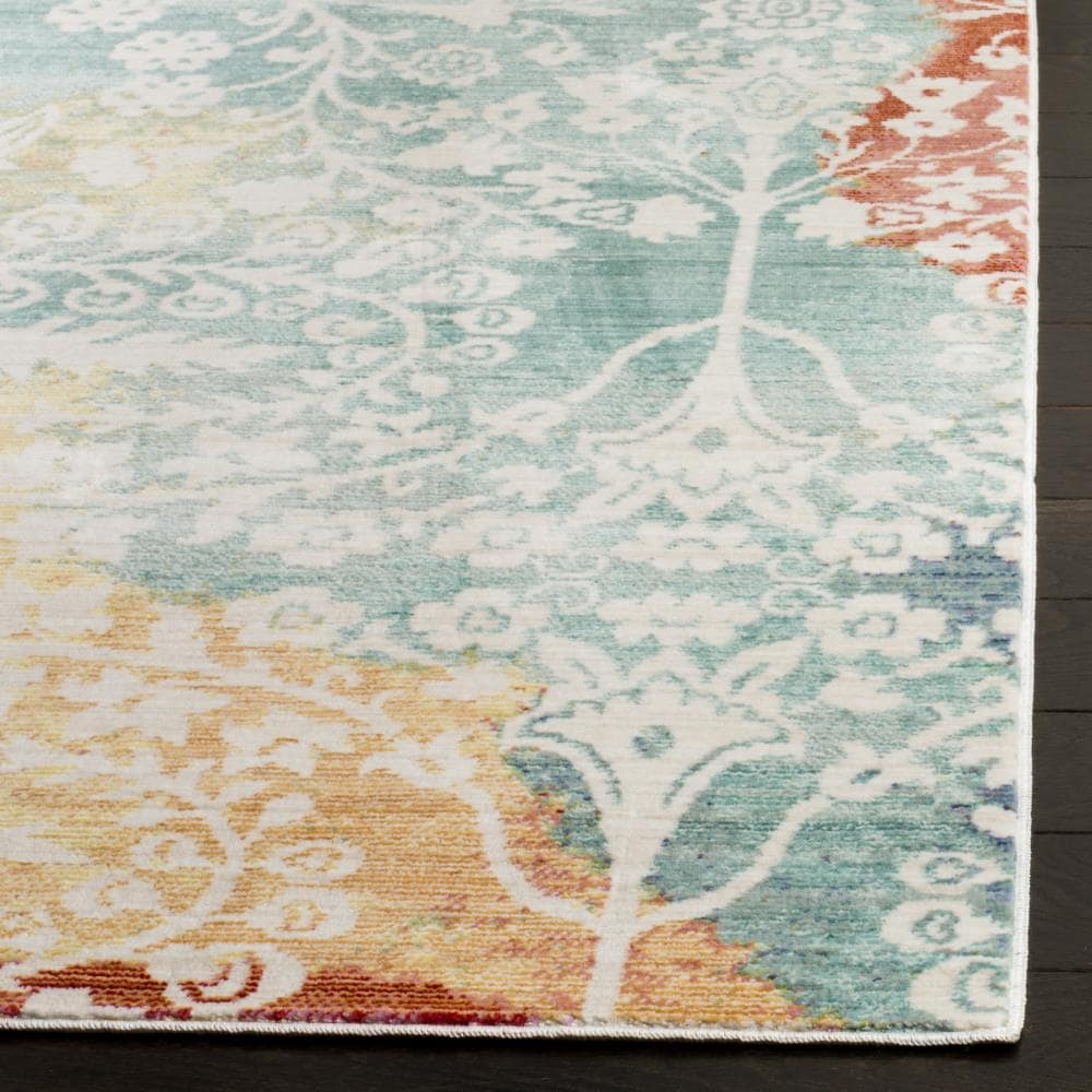 Blue and Rust Abstract Synthetic 6' x 9' Area Rug