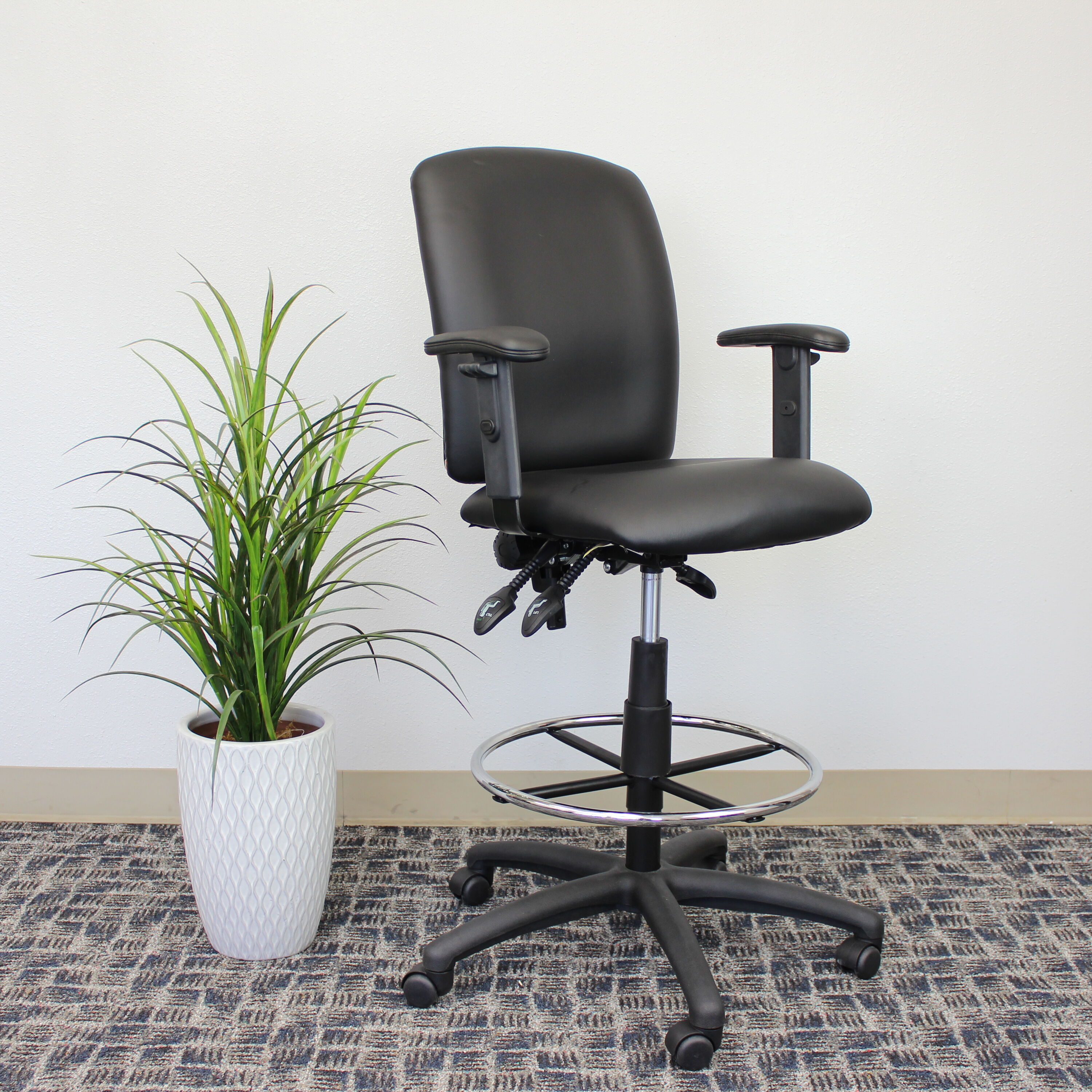 Adjustable Black LeatherPlus Drafting Chair with Swivel & Chrome Footring