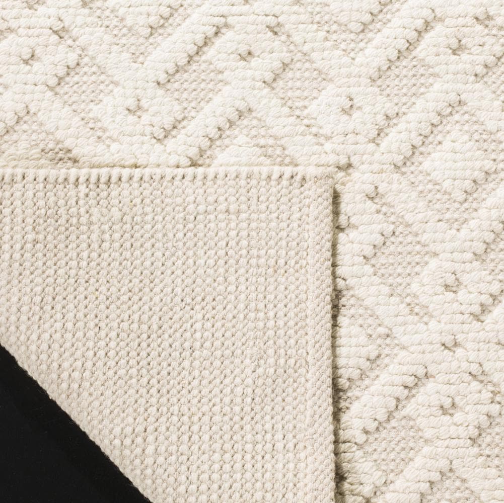Ivory Geometric Tufted Wool and Synthetic 6' x 9' Rug