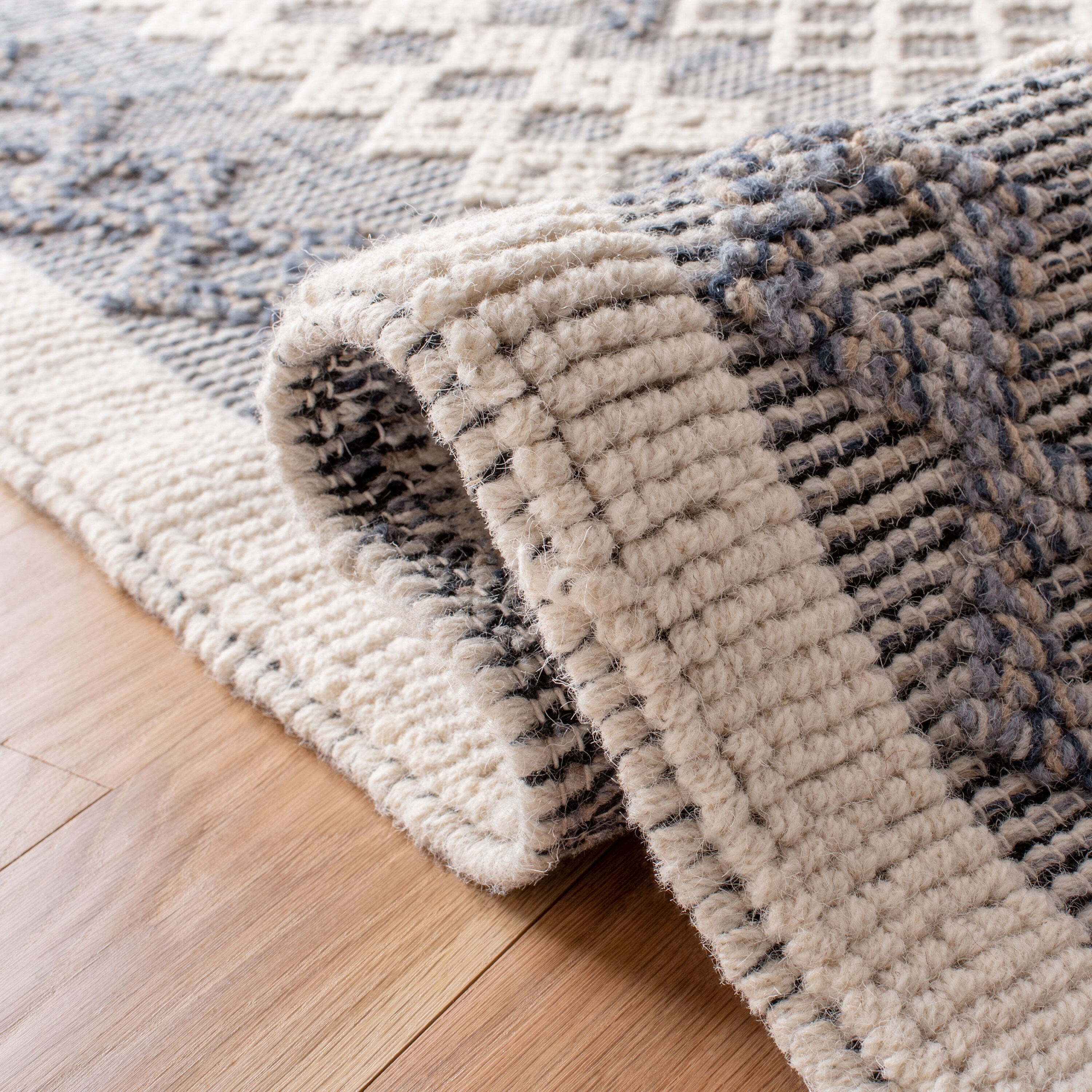 Natura 9' x 12' Blue and Cream Wool Handwoven Area Rug