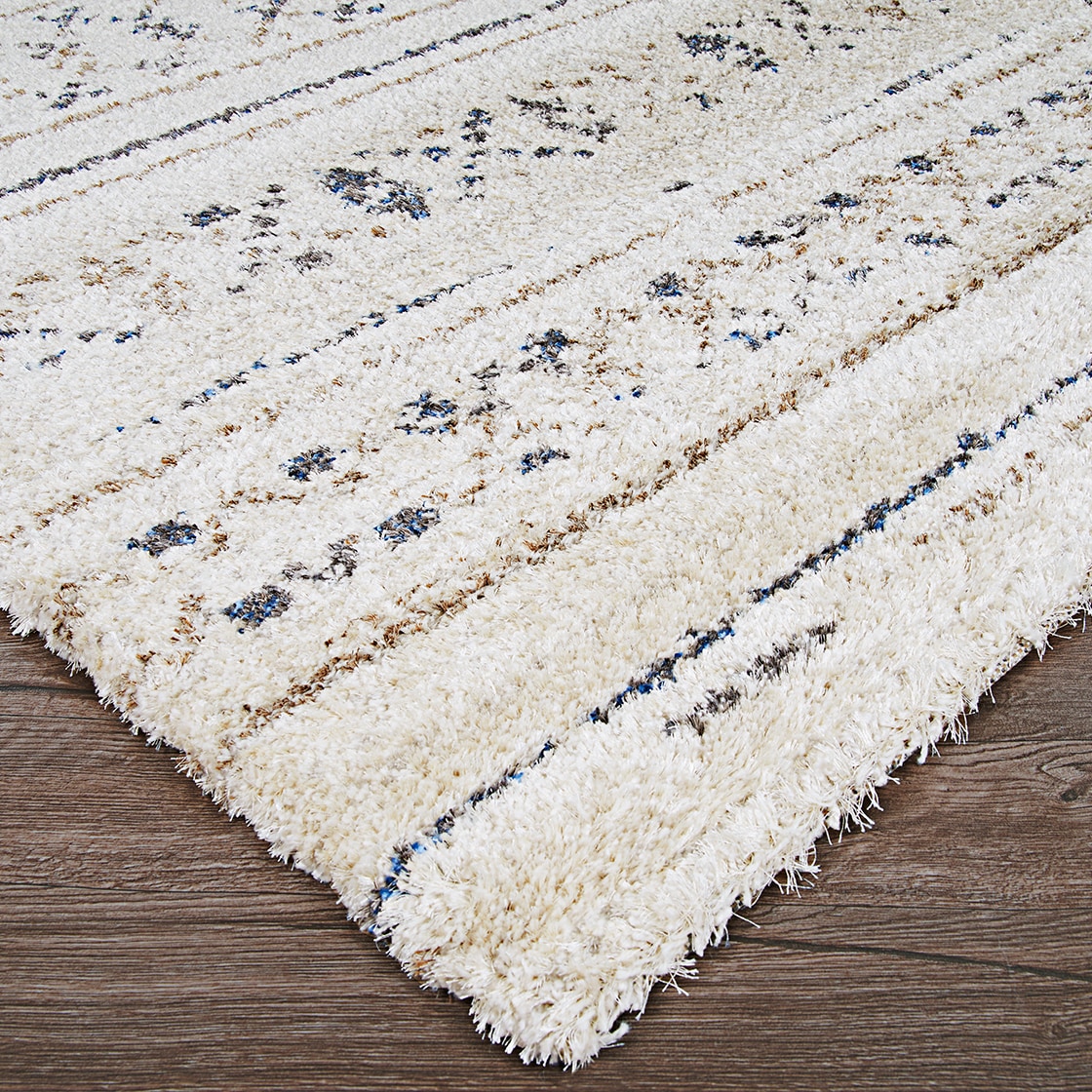 Ivory and Caramel Wool Synthetic Shag Area Rug