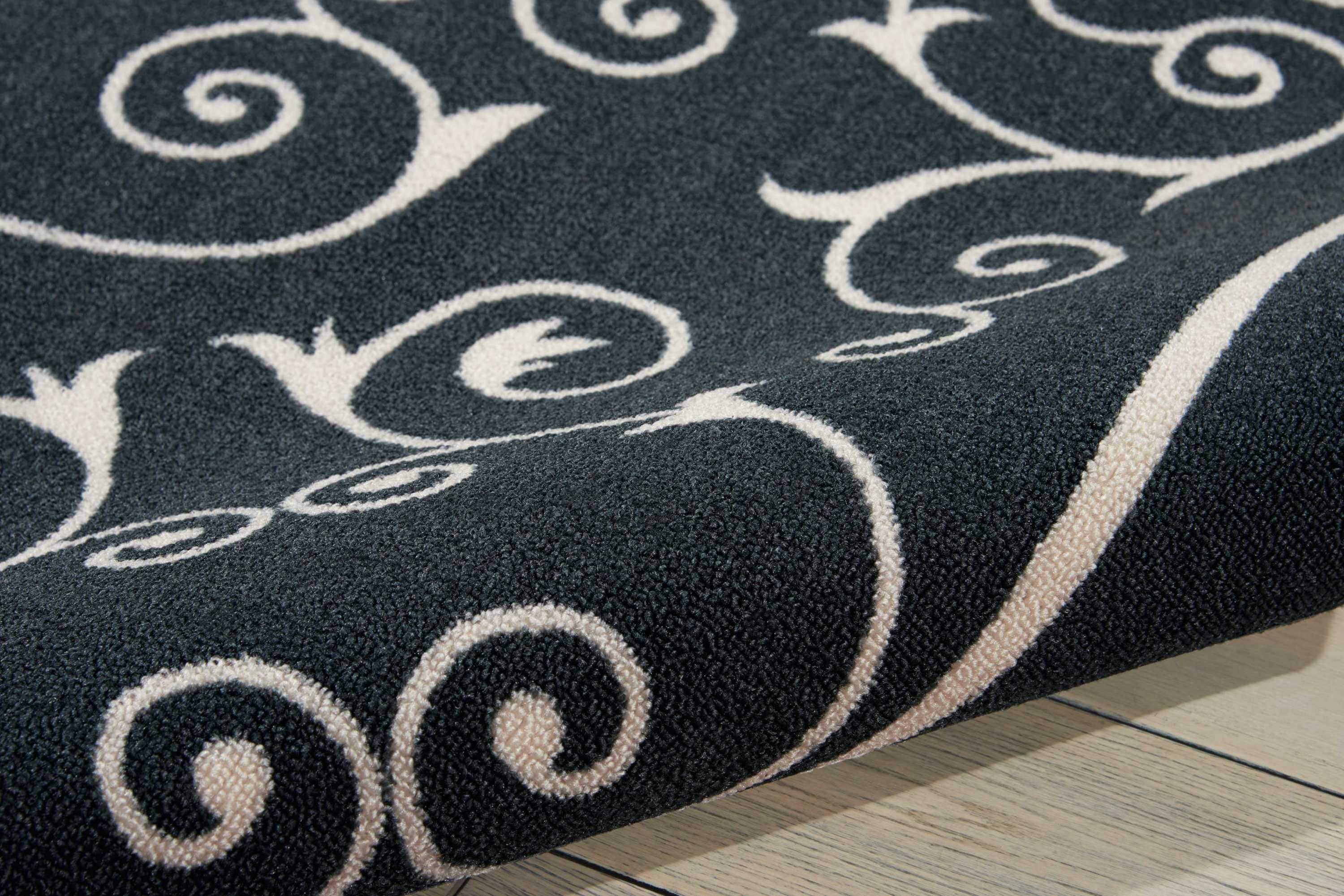 Classic Black Floral 5' x 7' Synthetic Indoor/Outdoor Area Rug