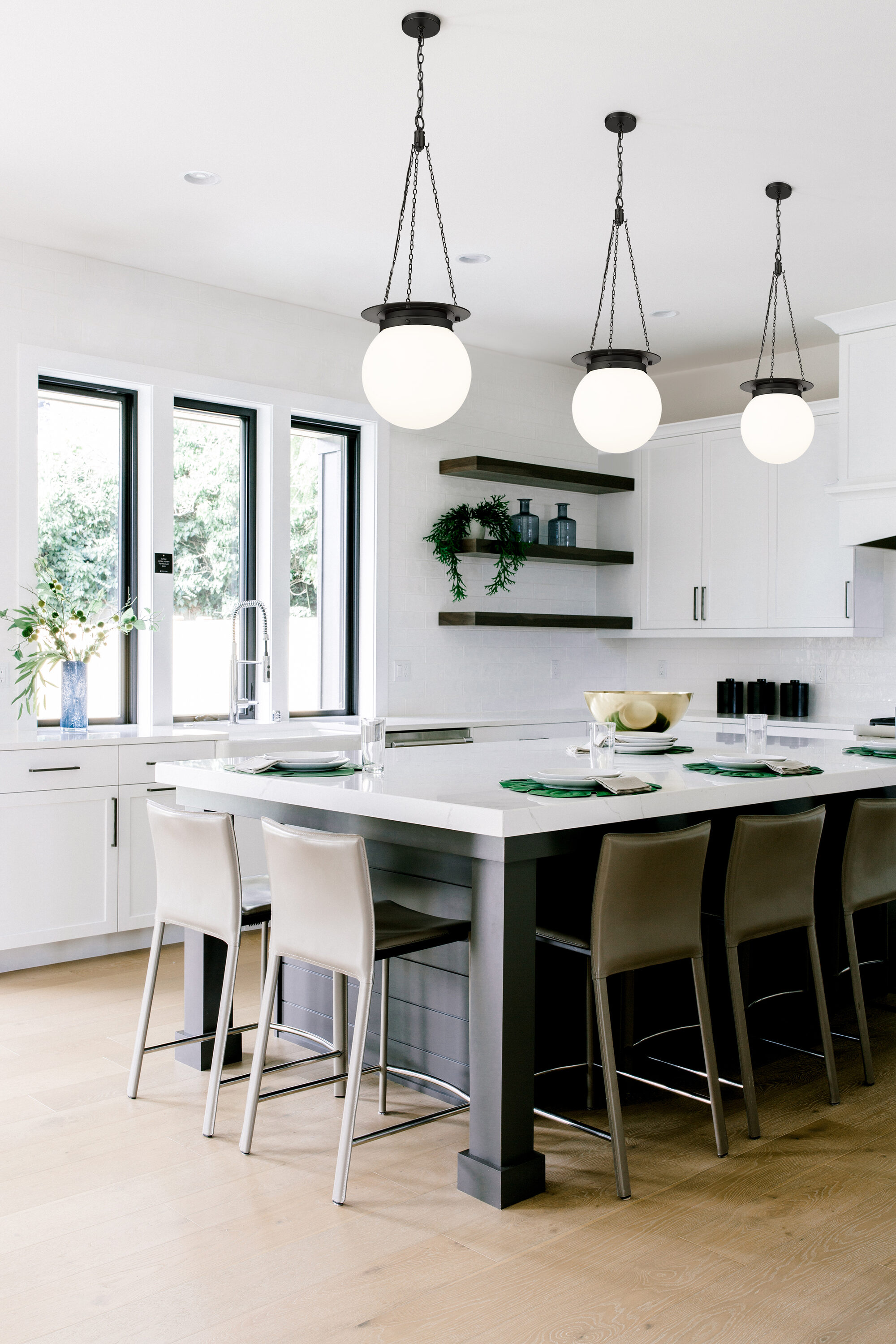 Calhoun Matte Black Steel and Glass Globe Pendant Light
