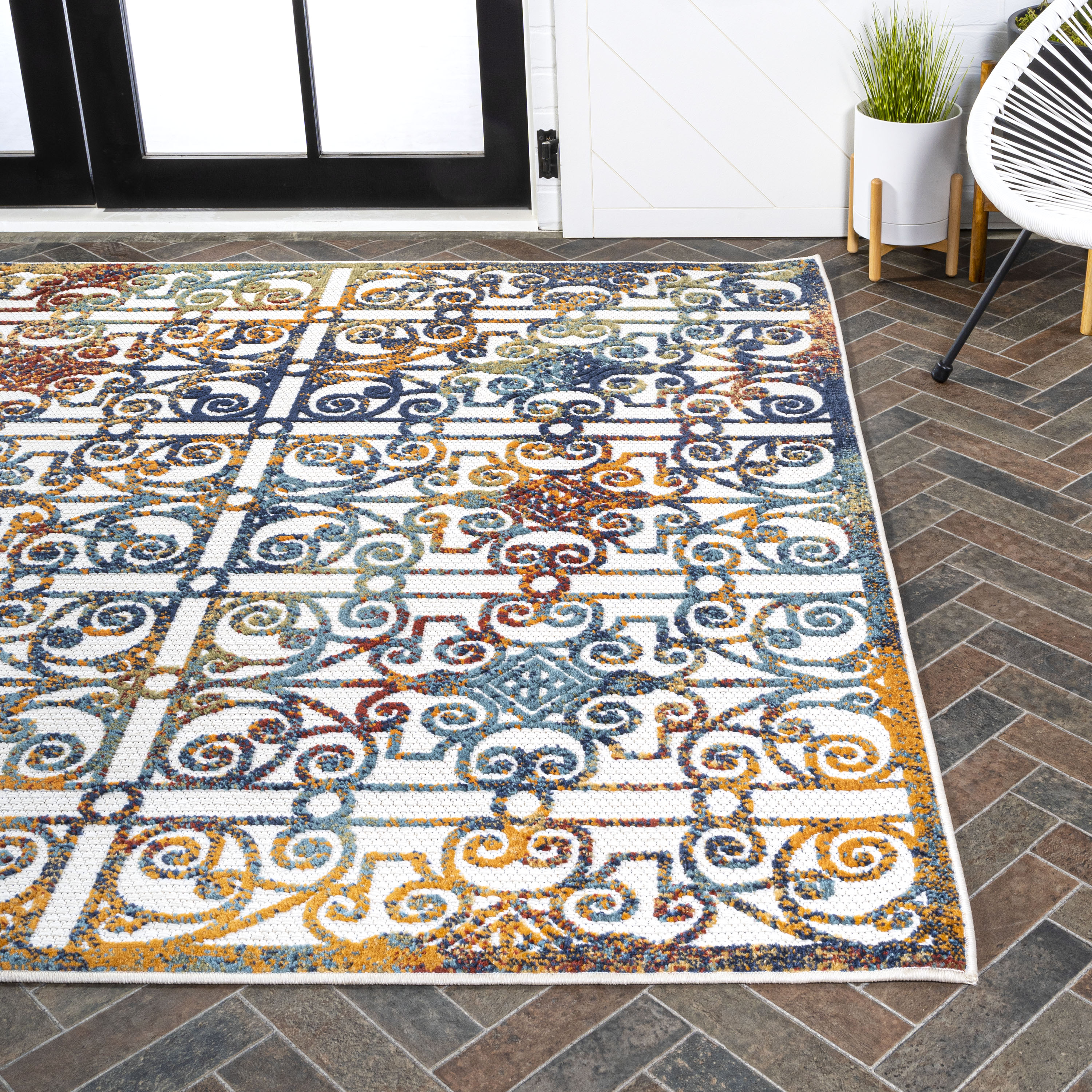 Blue and Cream Trellis Synthetic 4' x 6' Reversible Rug