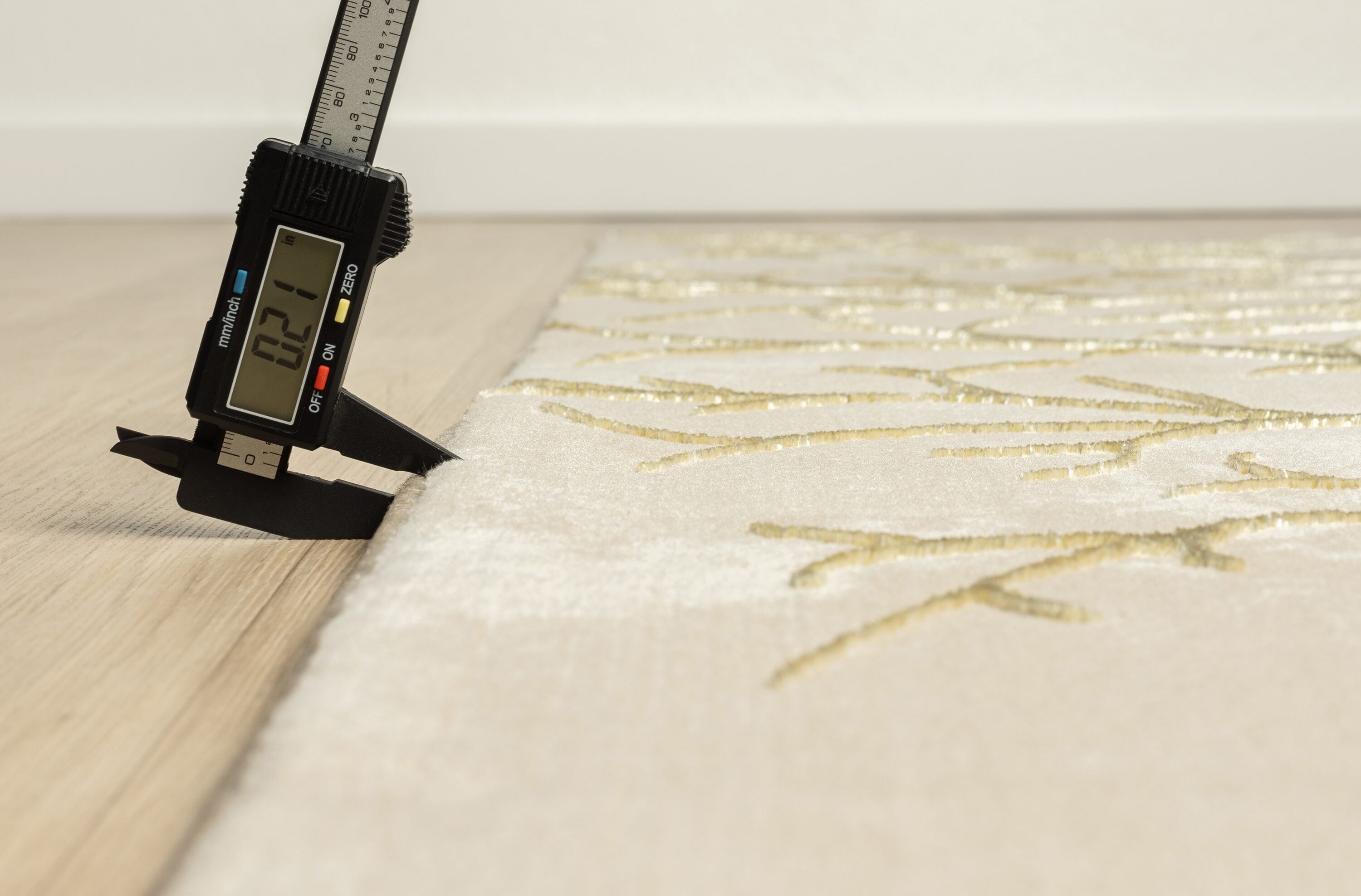 Beige and Gold Abstract Synthetic Area Rug