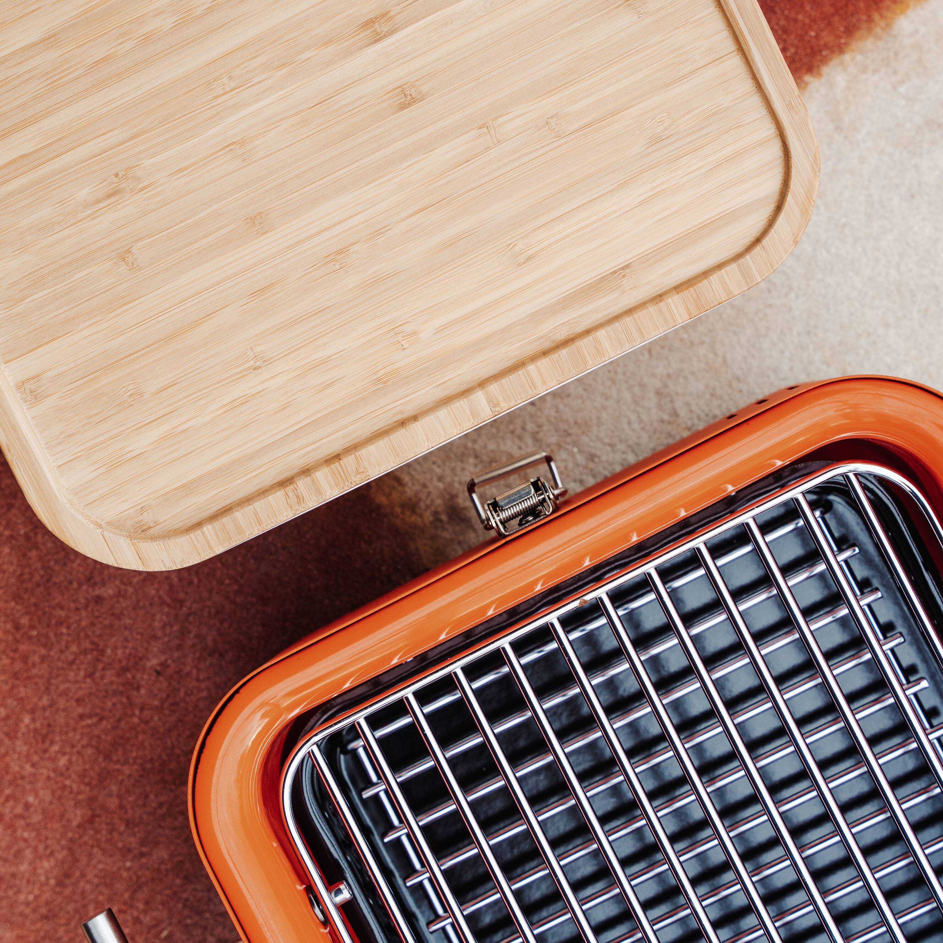 Everdure Orange Portable Charcoal Grill with Bamboo Board