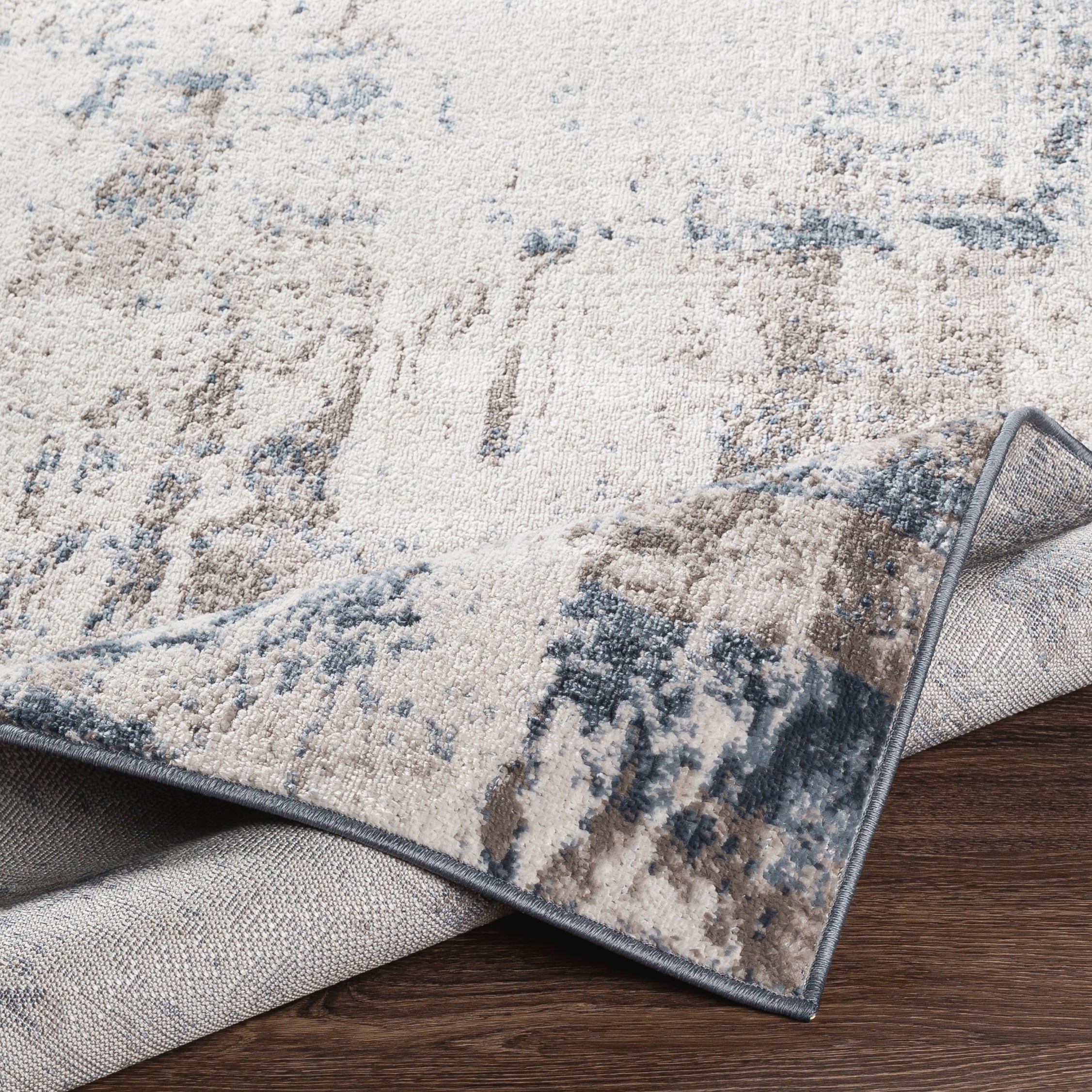 Livabliss Navy Blue Synthetic Rectangular 5' x 7' Stain-Resistant Area Rug