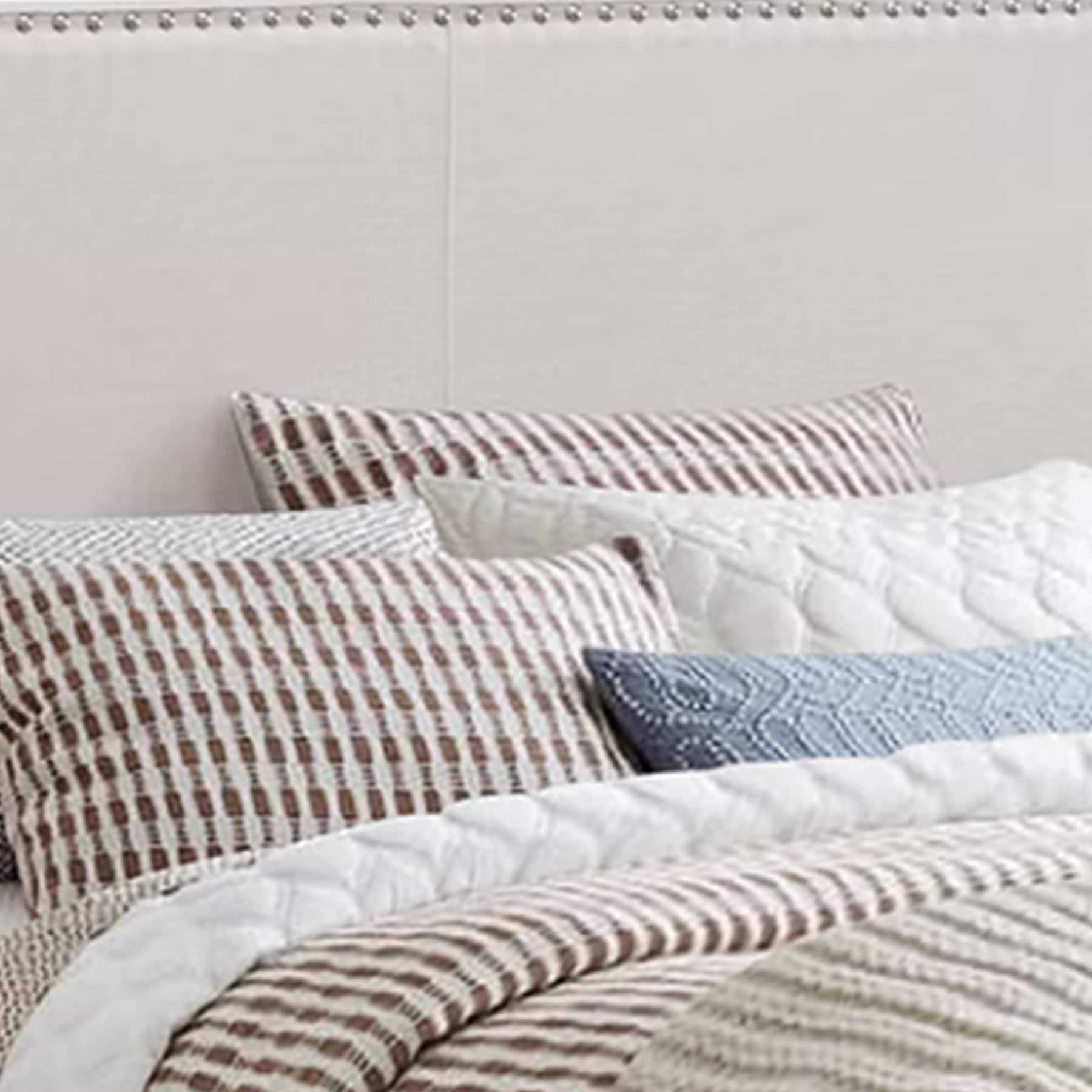 Ivory Upholstered Queen Platform Bed with Nailhead Trim and Wood Frame