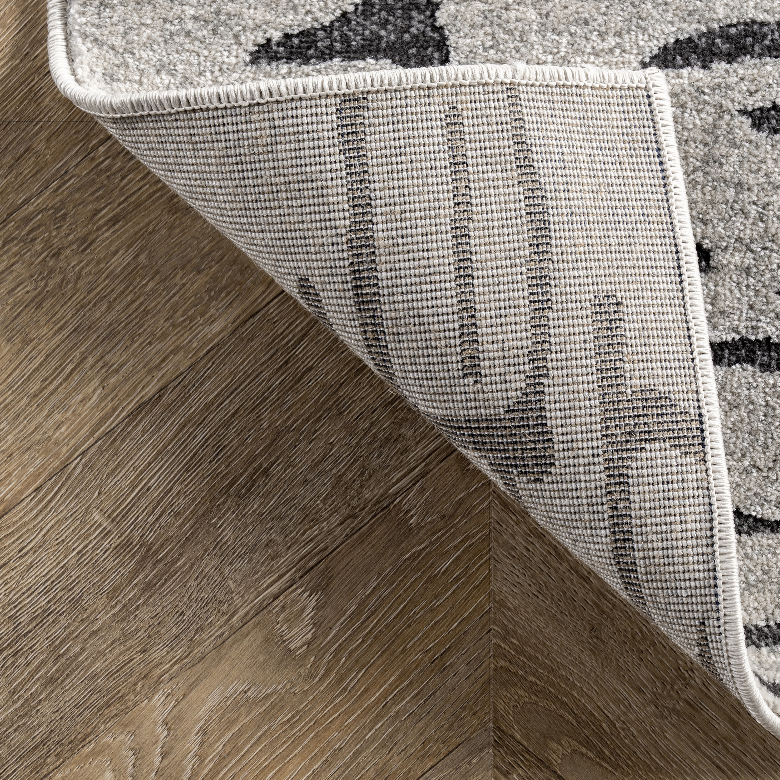 Ivory Tufted Reversible Abstract Synthetic 4' x 6' Area Rug
