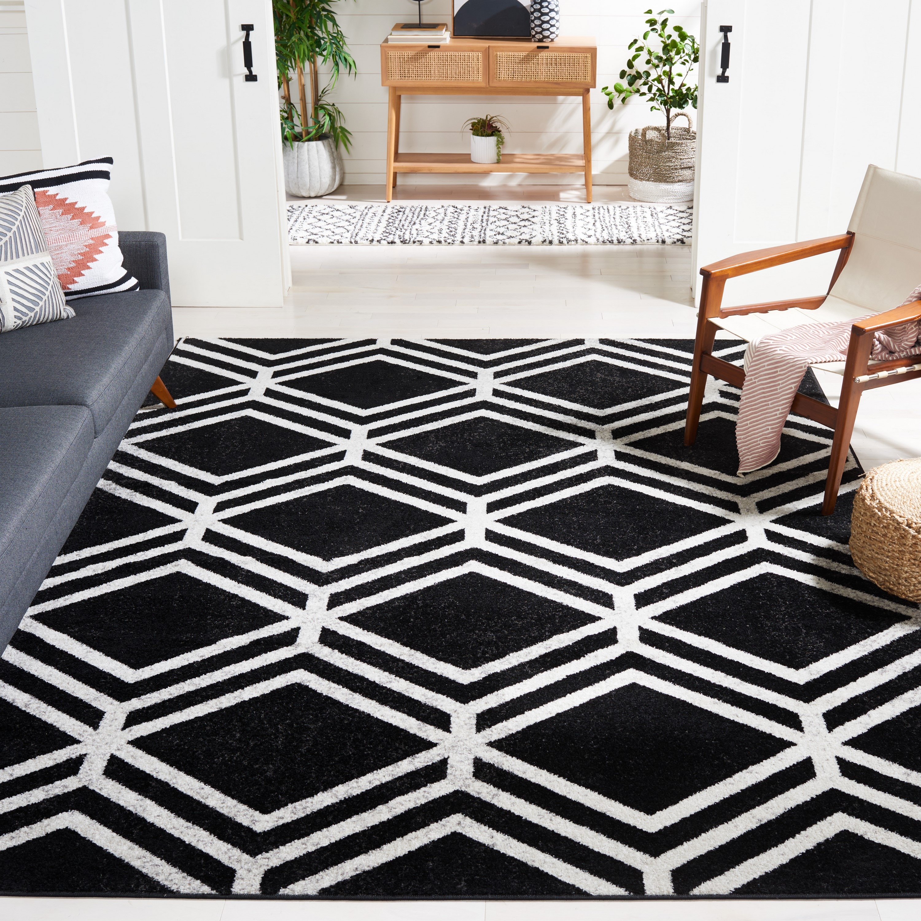 Black and Ivory Geometric 8' x 10' Washable Area Rug